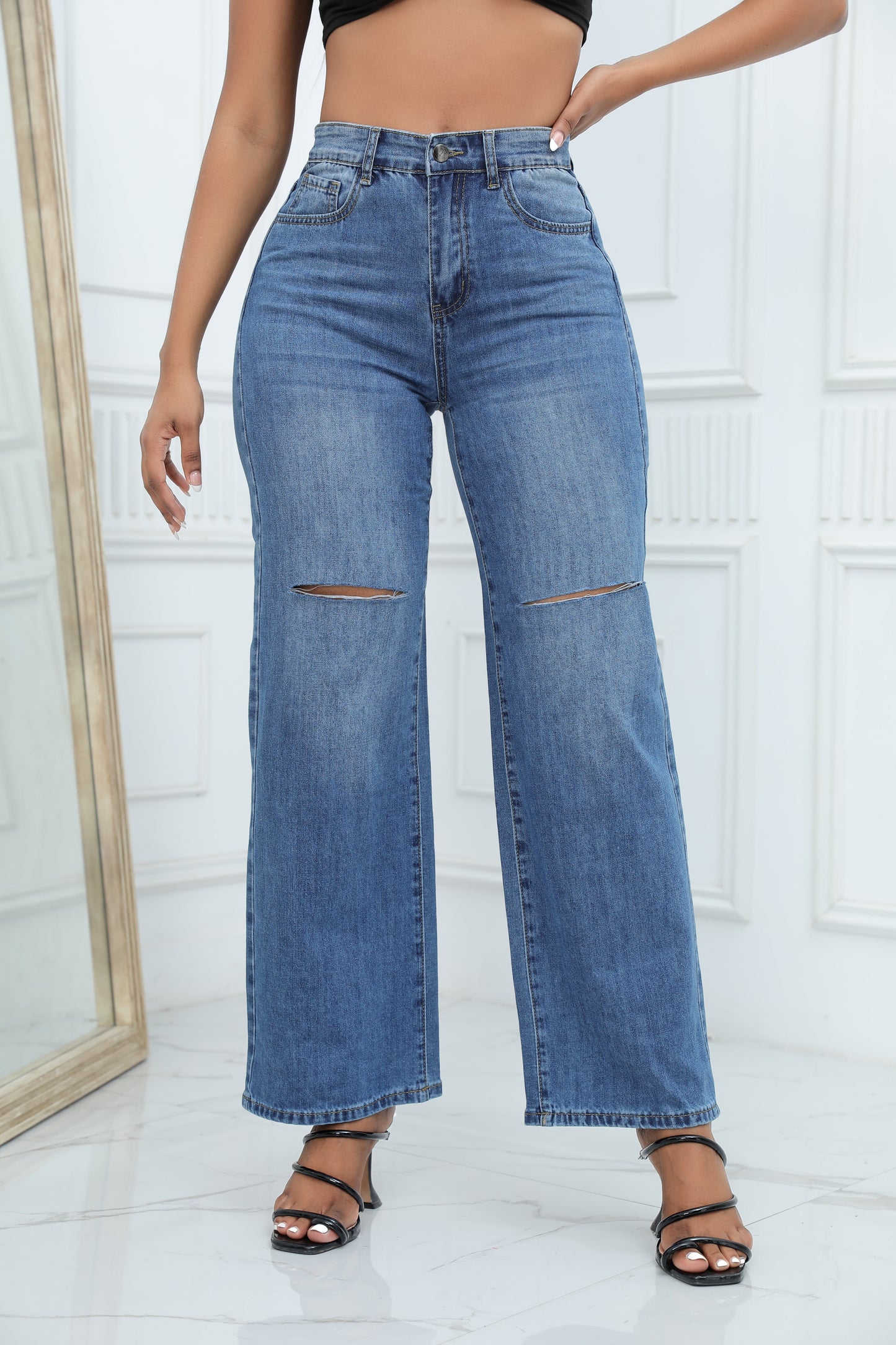 Women's mid-waist loose ripped bell-bottom jeans