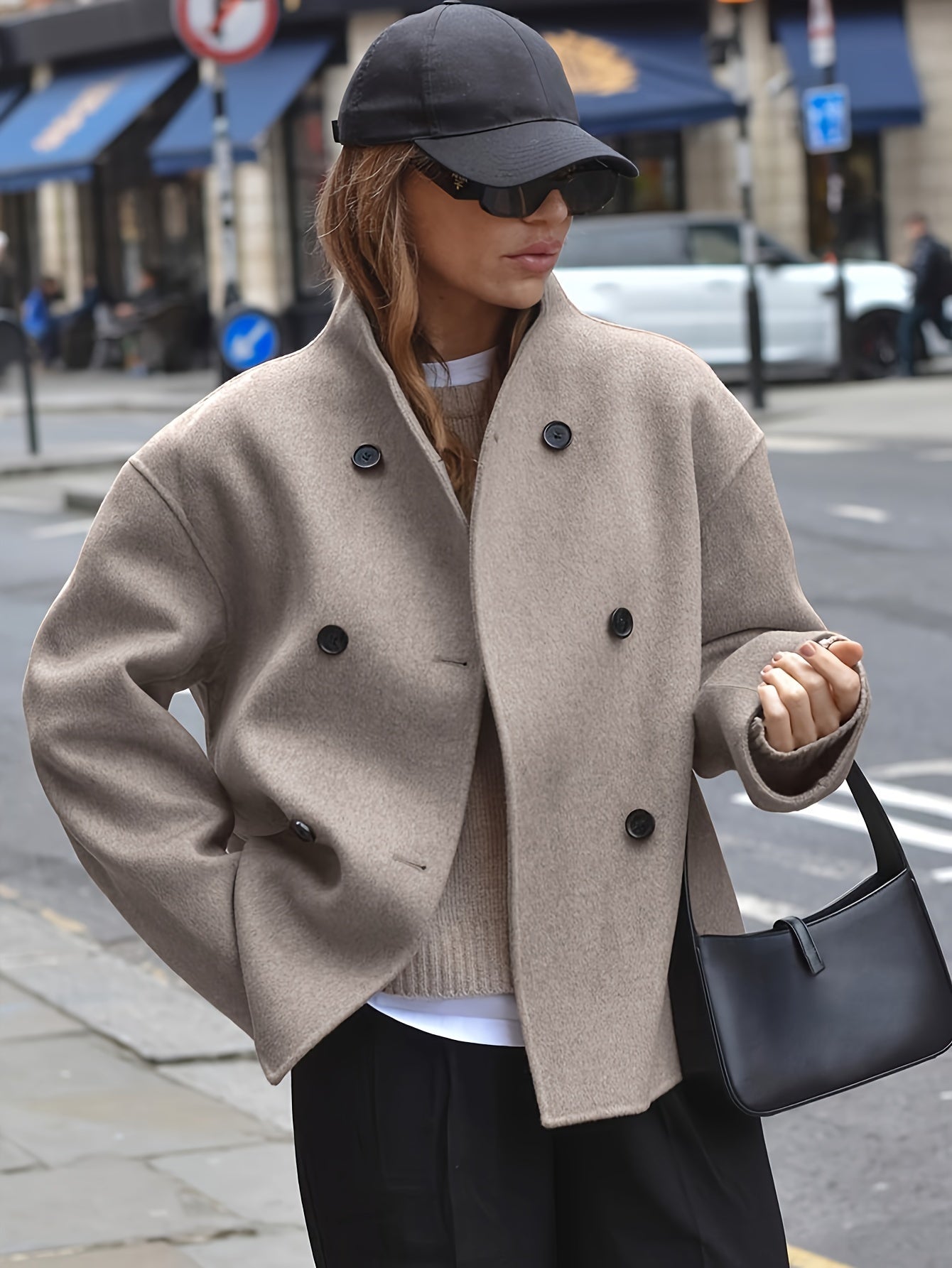 Timeless double-breasted coat with stand collar and elegant design for women