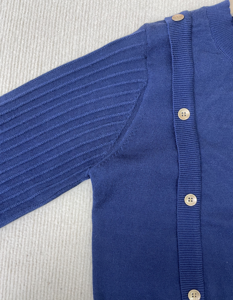 Women's plain round neck sweater with button design