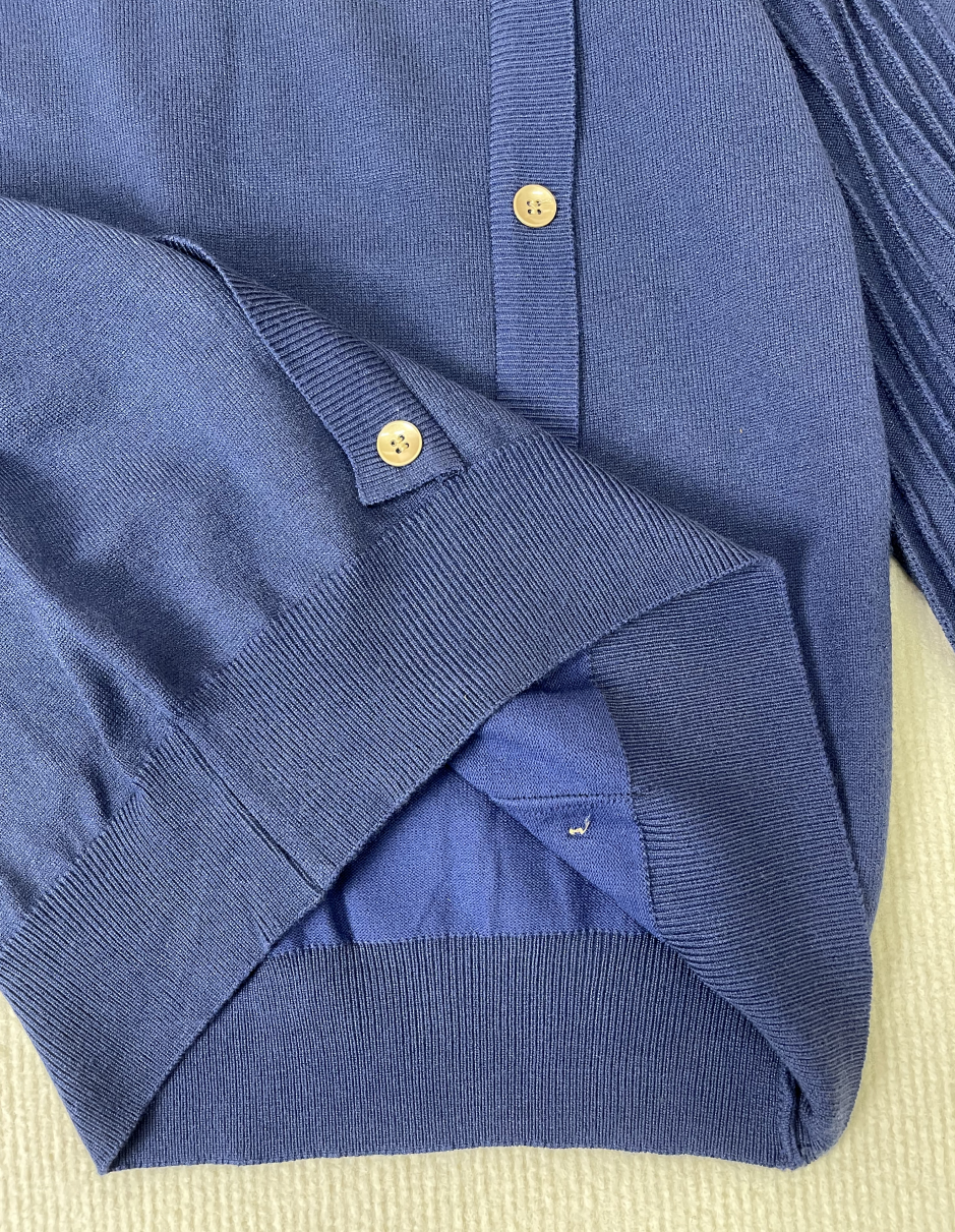 Women's plain round neck sweater with button design