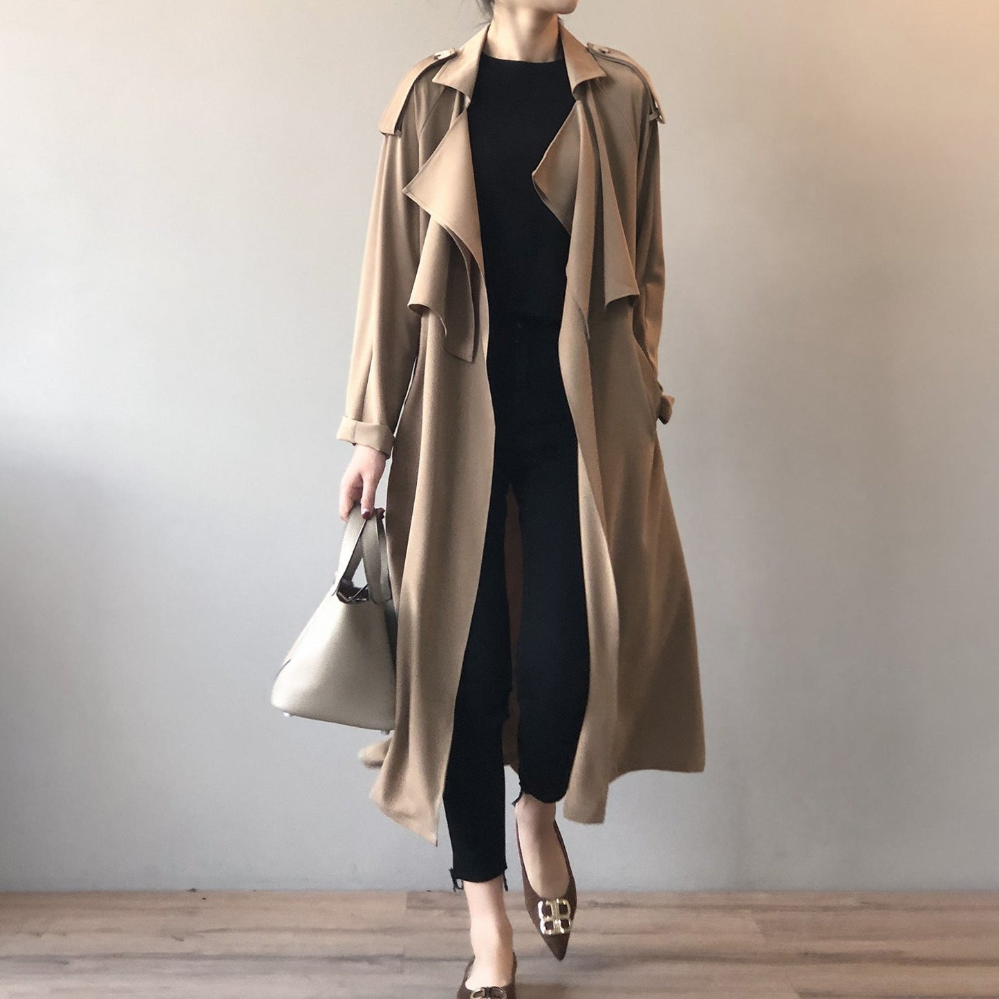 Women’s long trench coat with lapel collar