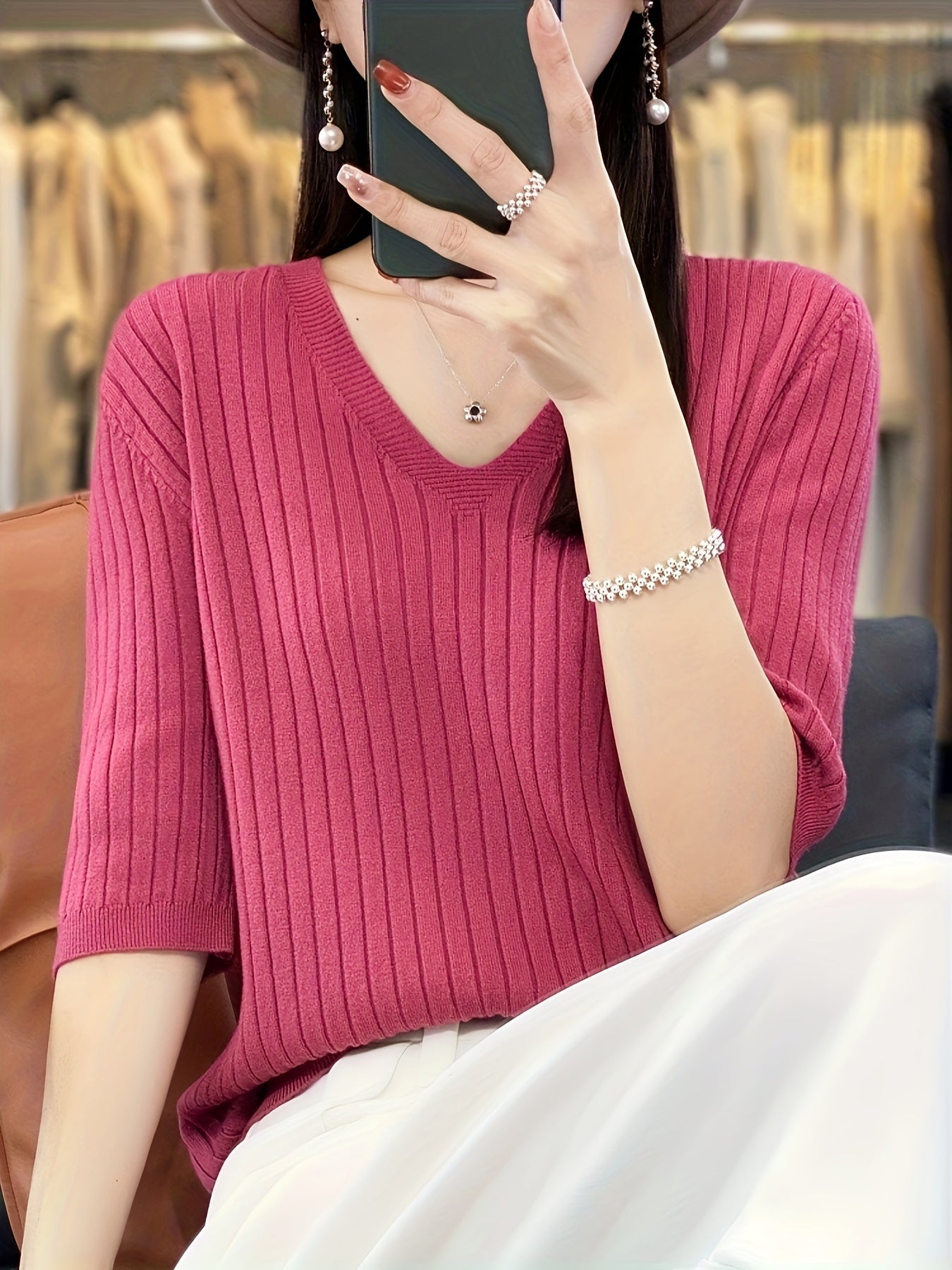 Stylish ribbed knit v-neck top with short sleeves and flattering fit for women