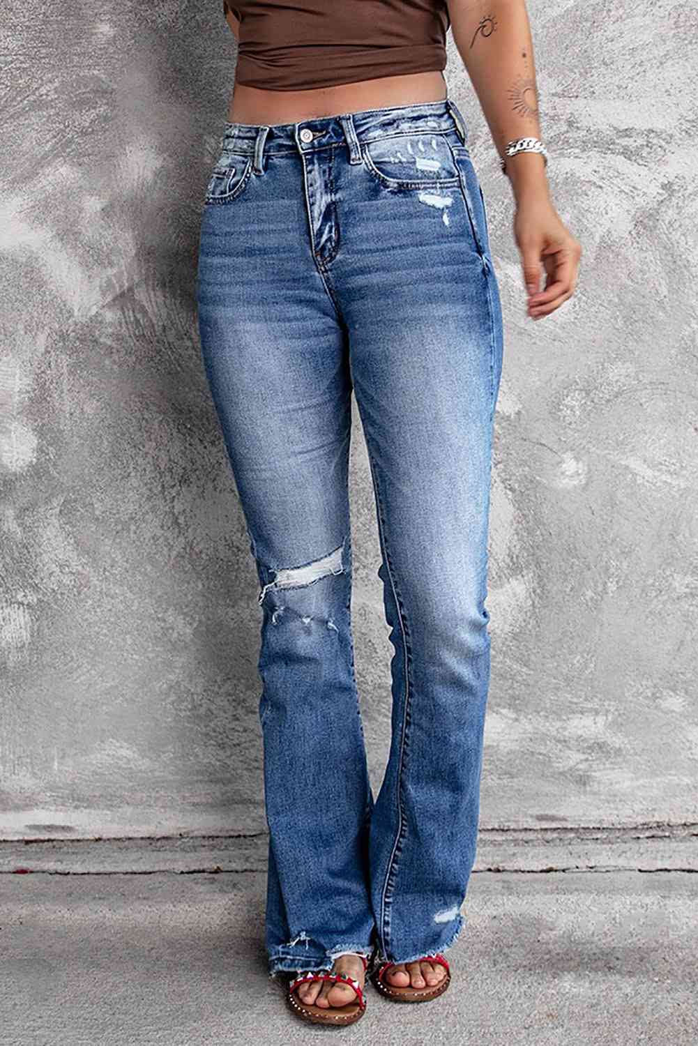 Kamaria - distressed flared jeans with pockets