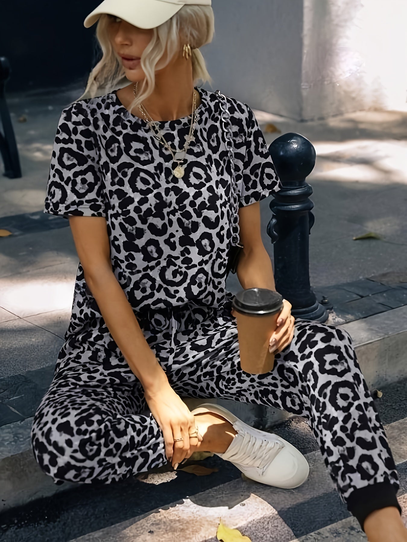 Leopard print two-piece set with casual top and drawstring pants for women
