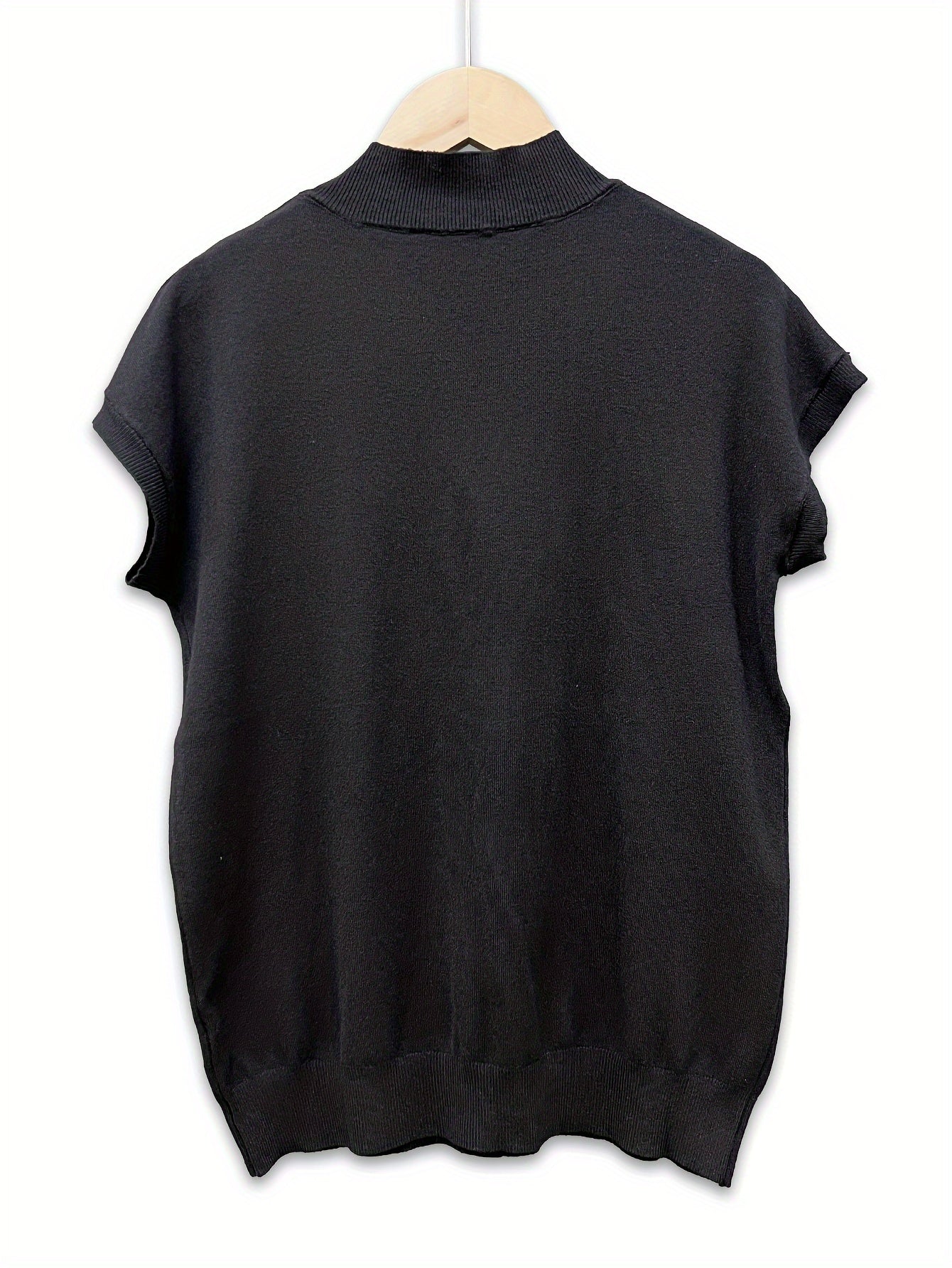 Sleeveless high-neck knit top with a fitted design for women