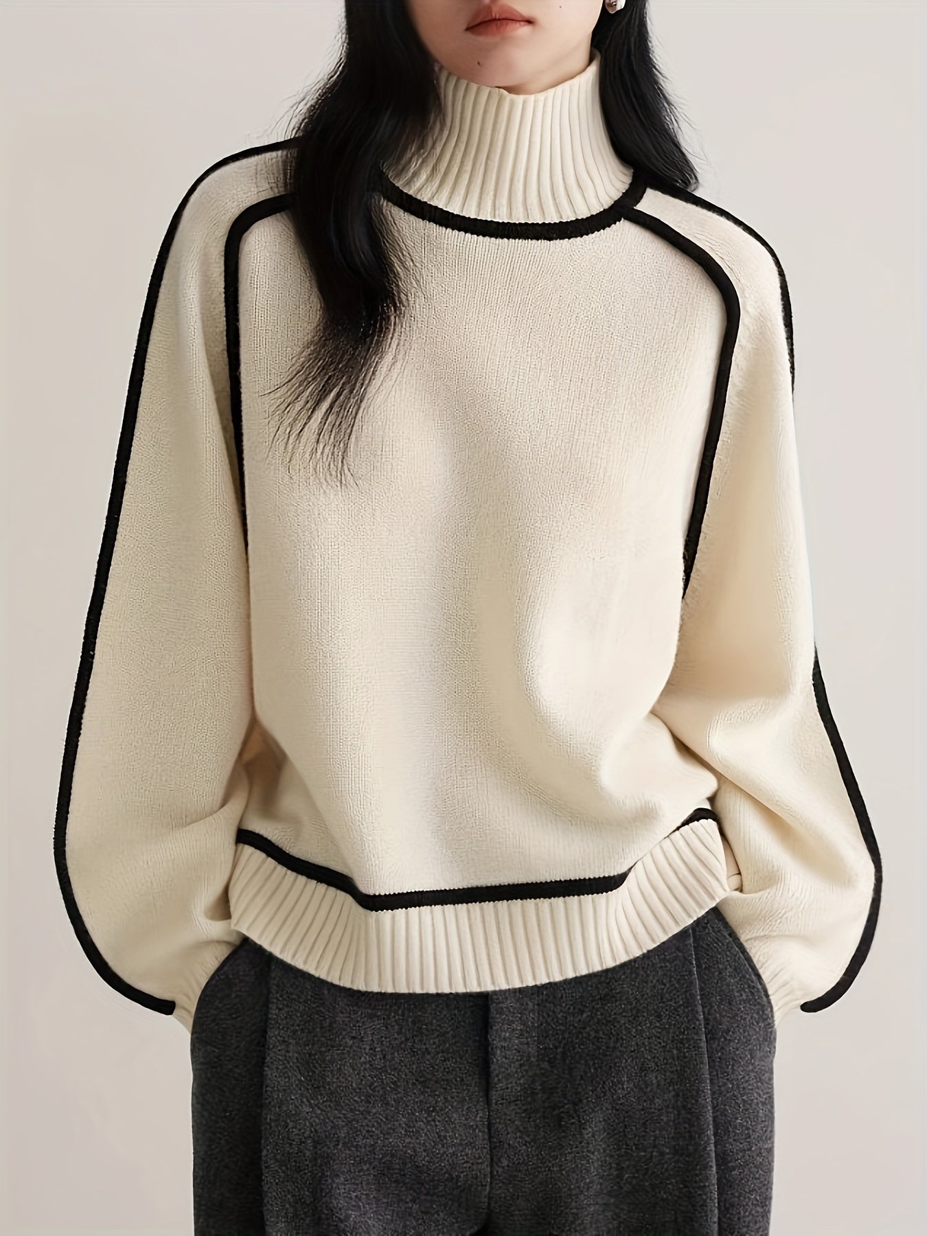 High-neck knit sweater with outlined design and long sleeves for women