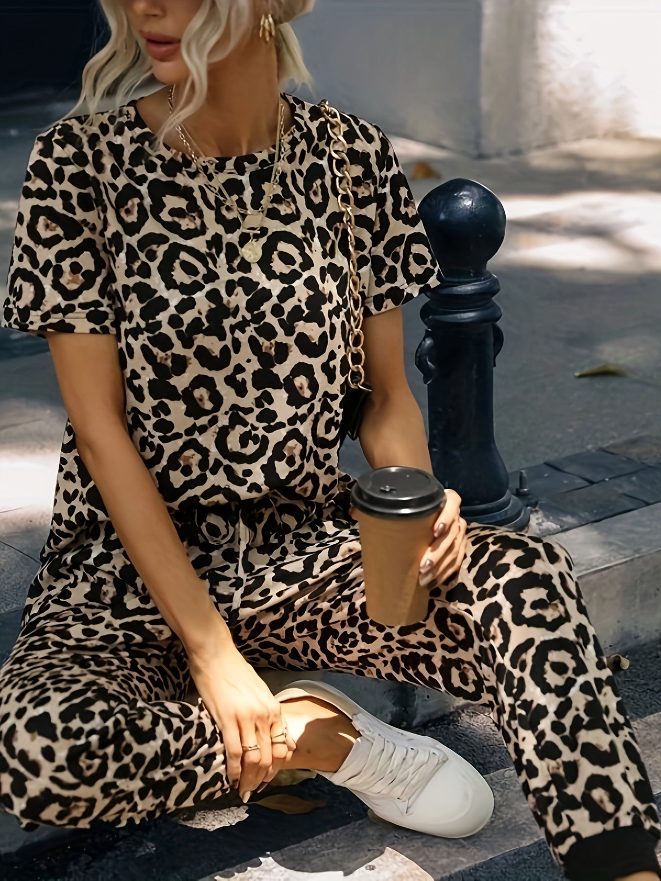 Leopard print two-piece set with casual top and drawstring pants for women