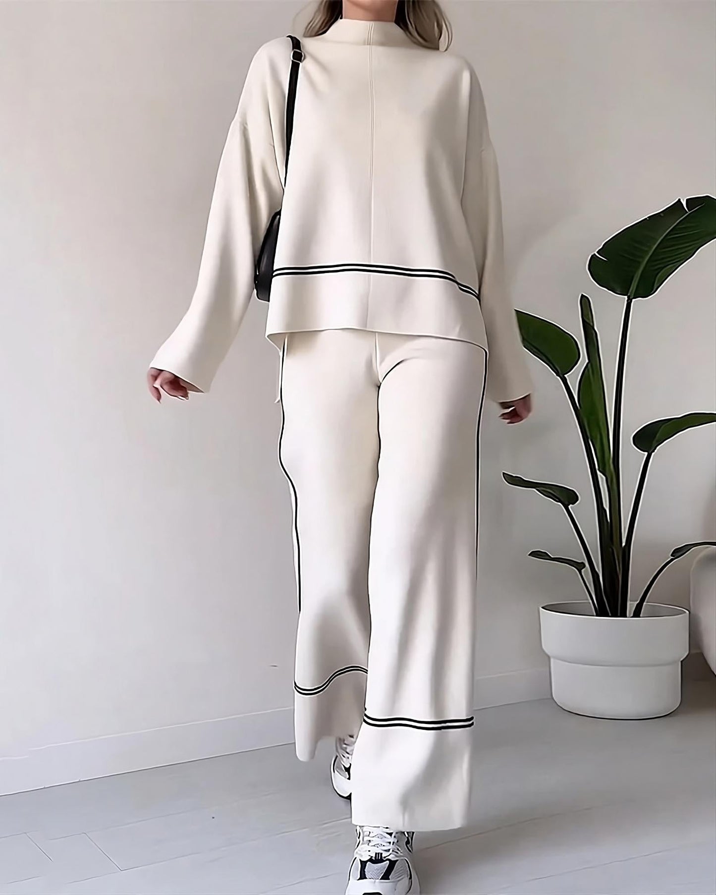 Women elegant turtleneck top and wide pants set