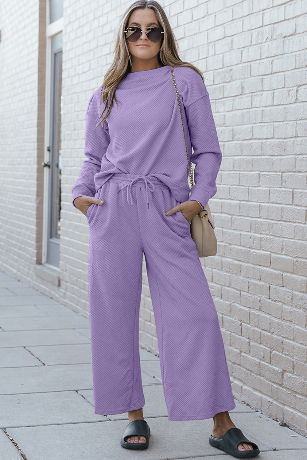 Women's textured long sleeve top and drawstring pants set