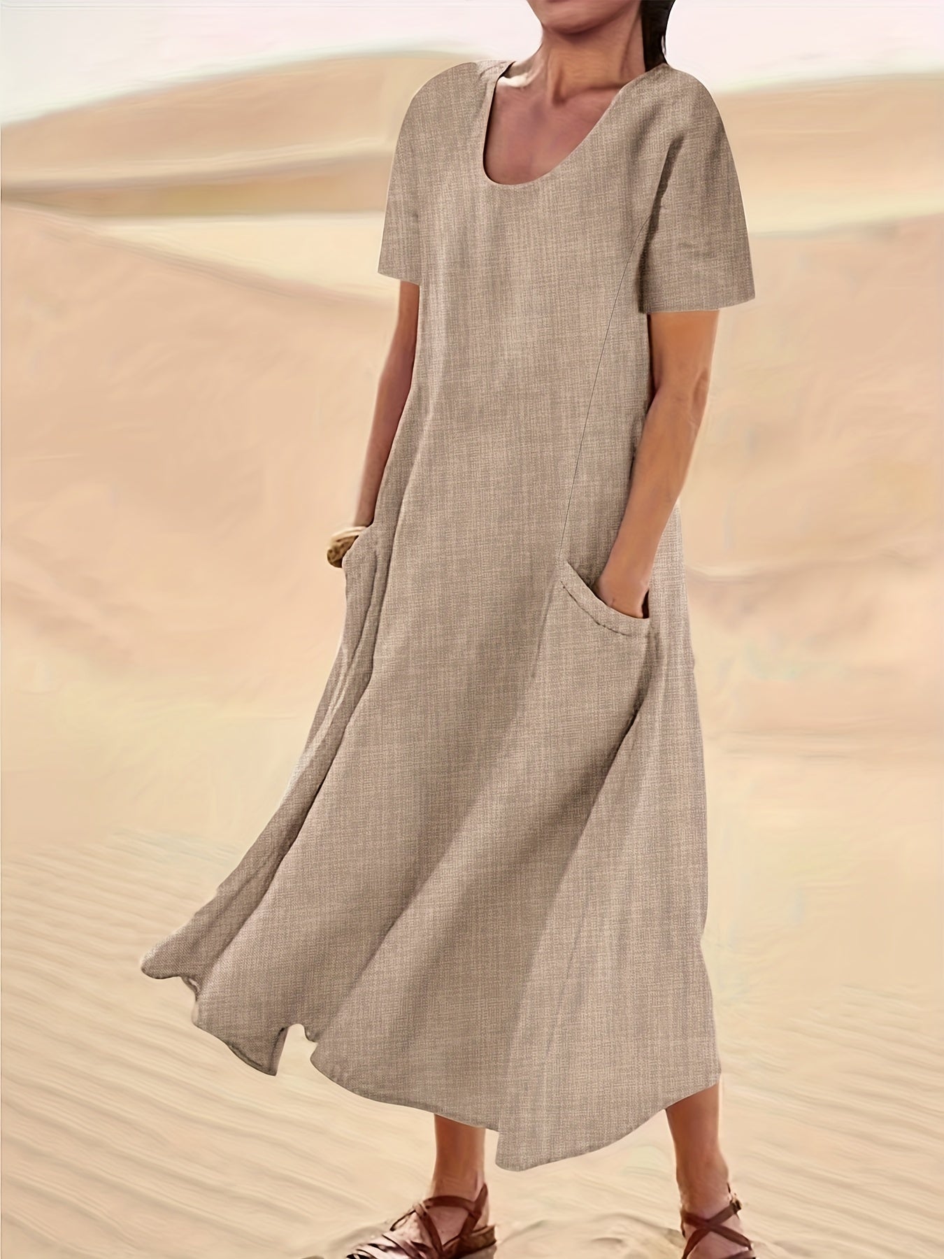 Flowy short-sleeve maxi dress with side pockets for casual and vacation wear for women