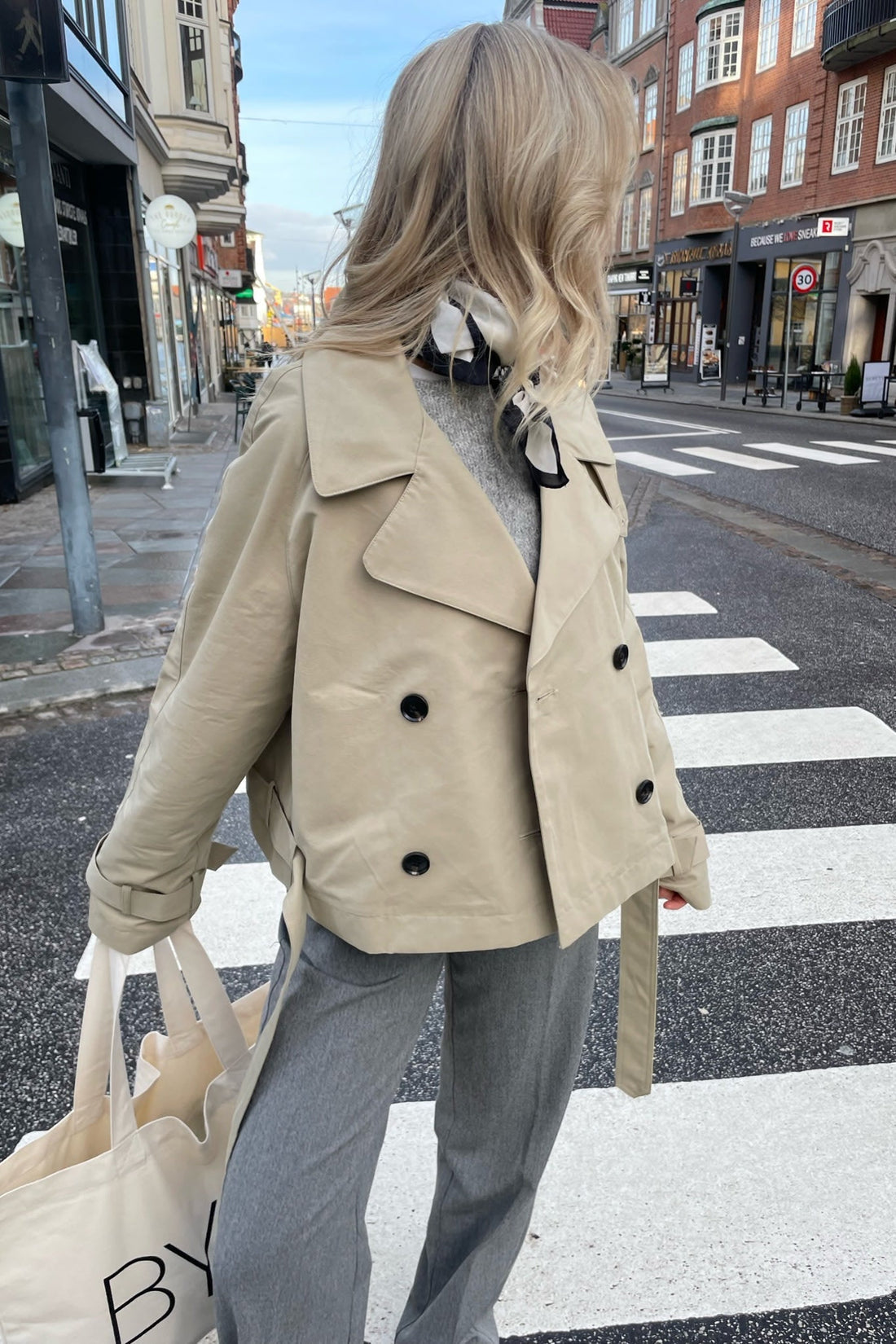 Women's coat in beige with belt