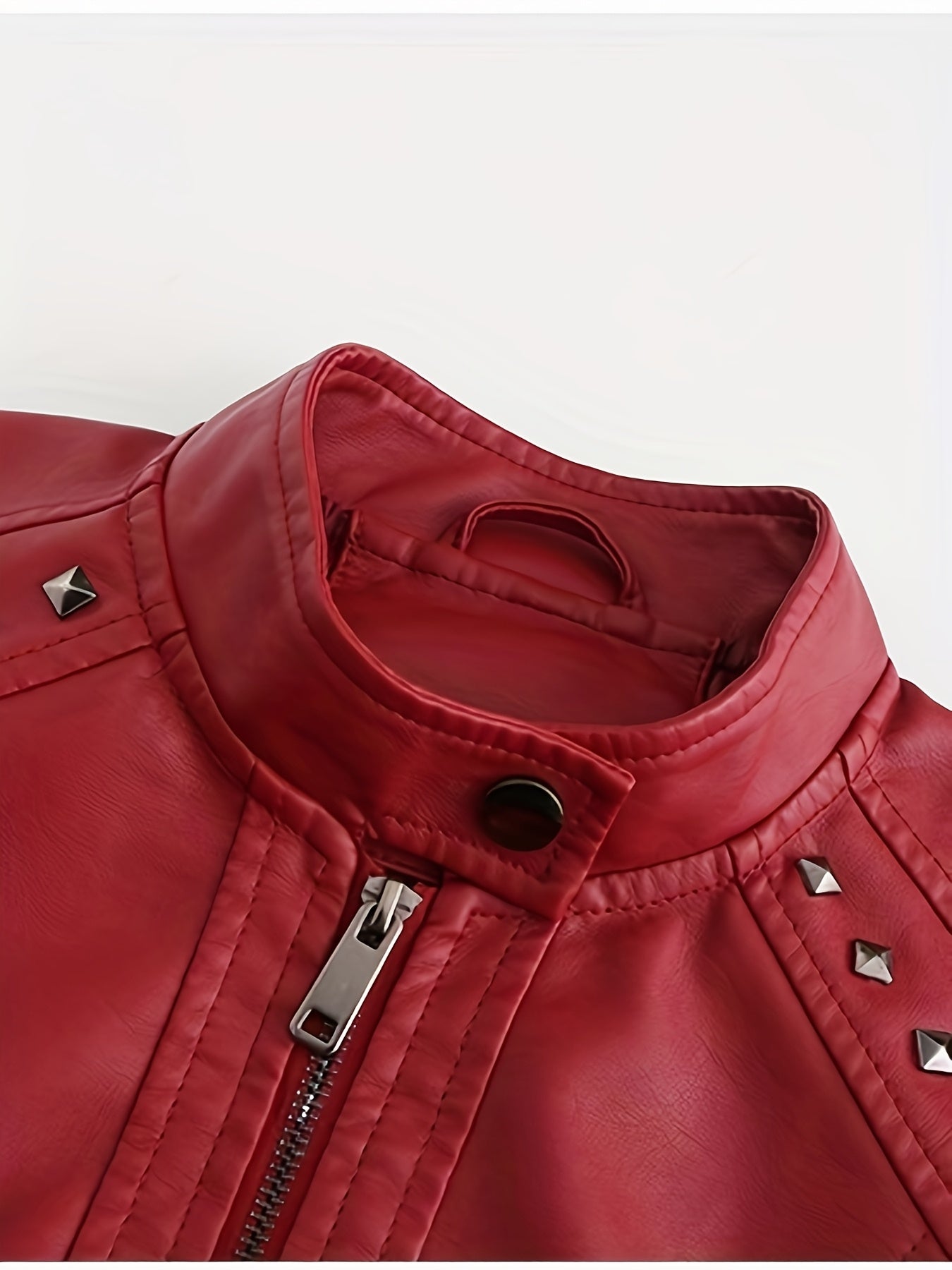 Studded moto jacket with zip closure and stand collar for women
