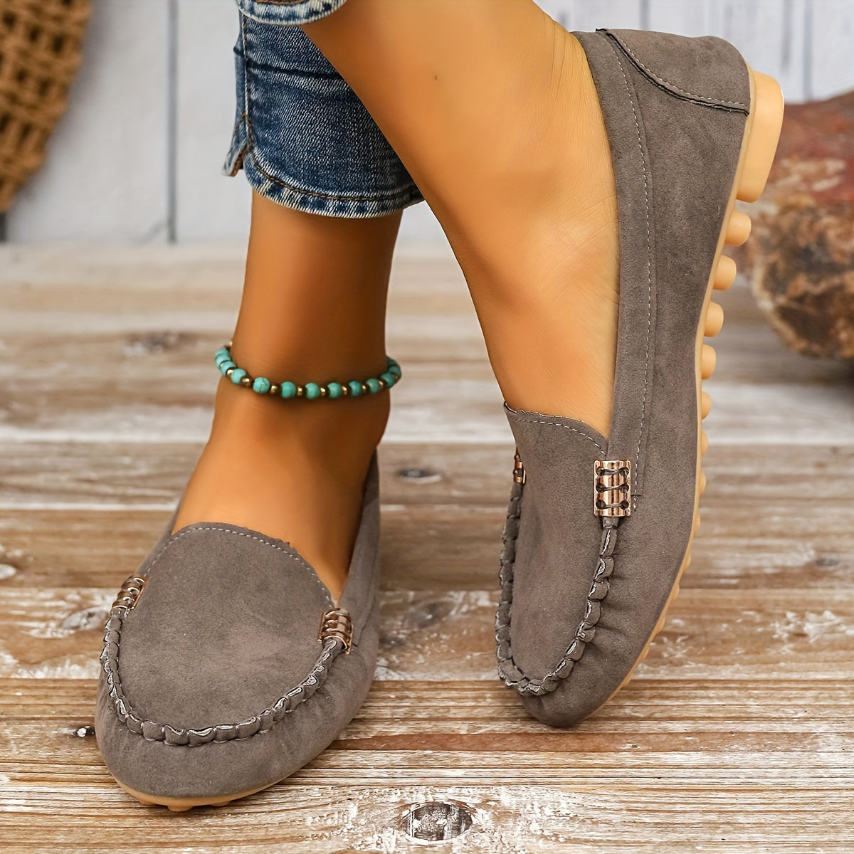 Slip-on moccasin loafers with decorative stitching for women