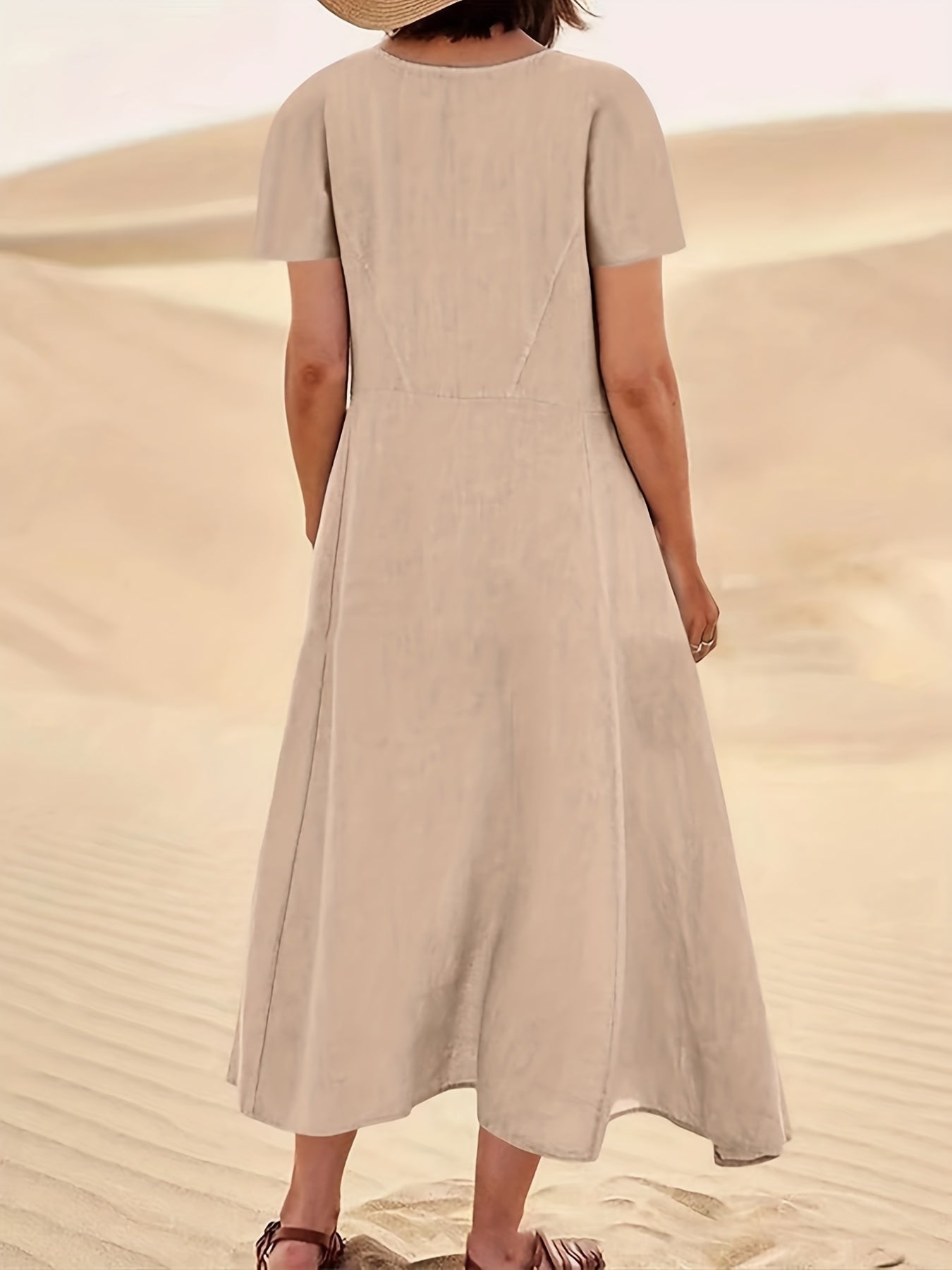 Flowy short-sleeve maxi dress with side pockets for casual and vacation wear for women