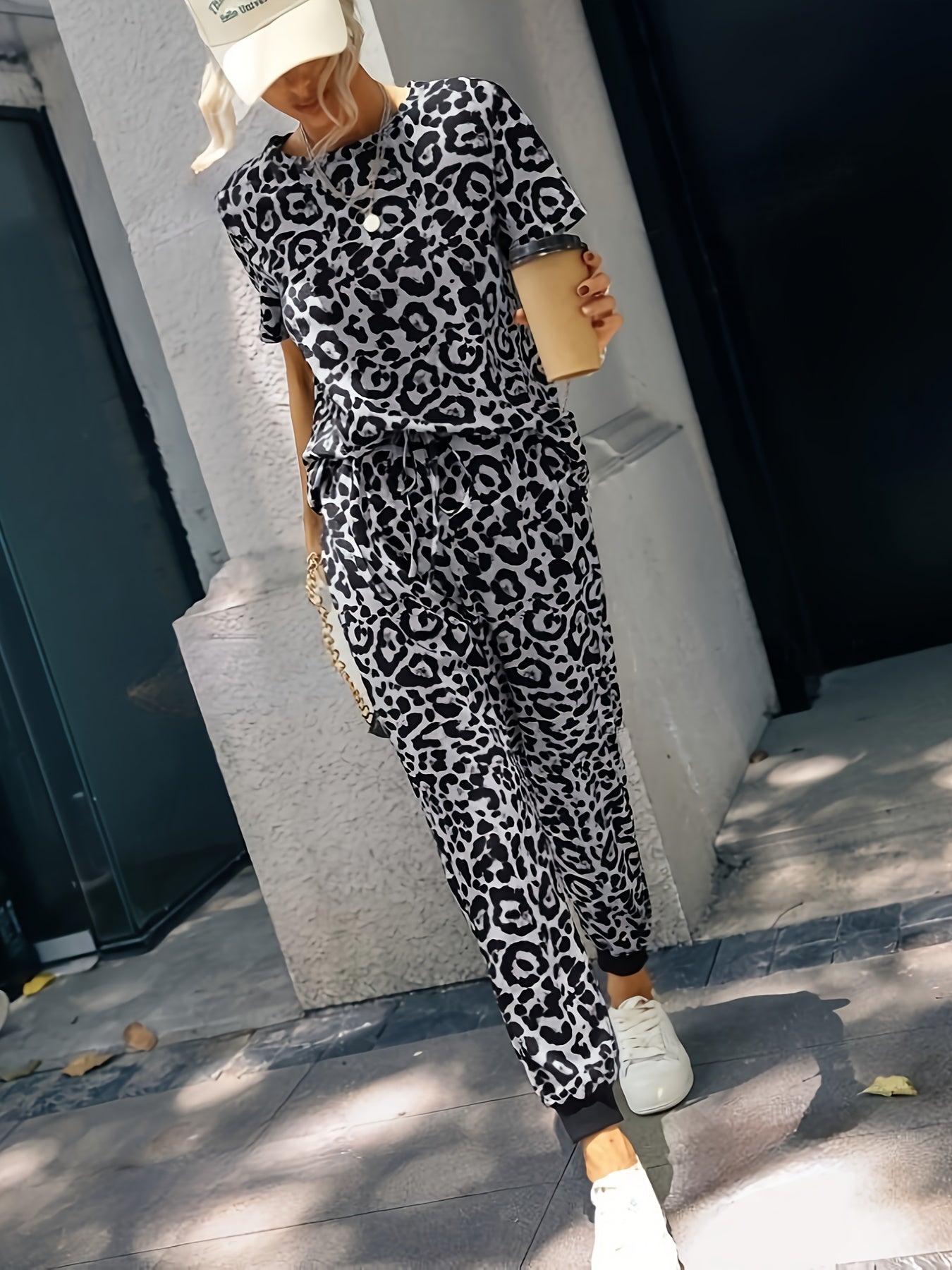 Leopard print two-piece set with casual top and drawstring pants for women