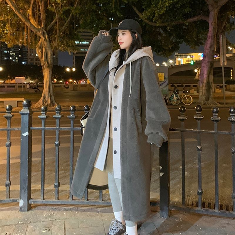 Women's cold weather jacket with sherpa hood