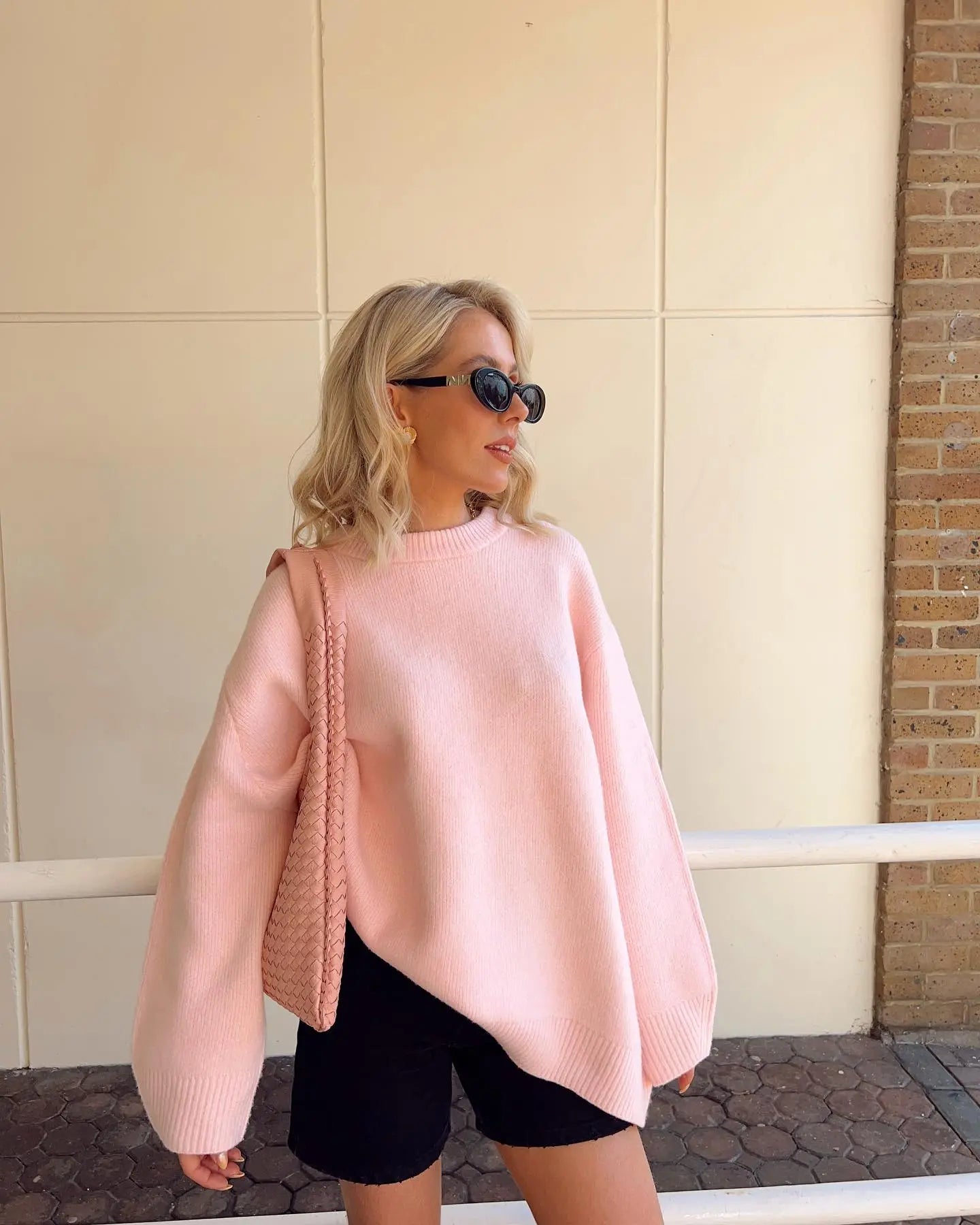 Women's loose pink round neck pullover sweater