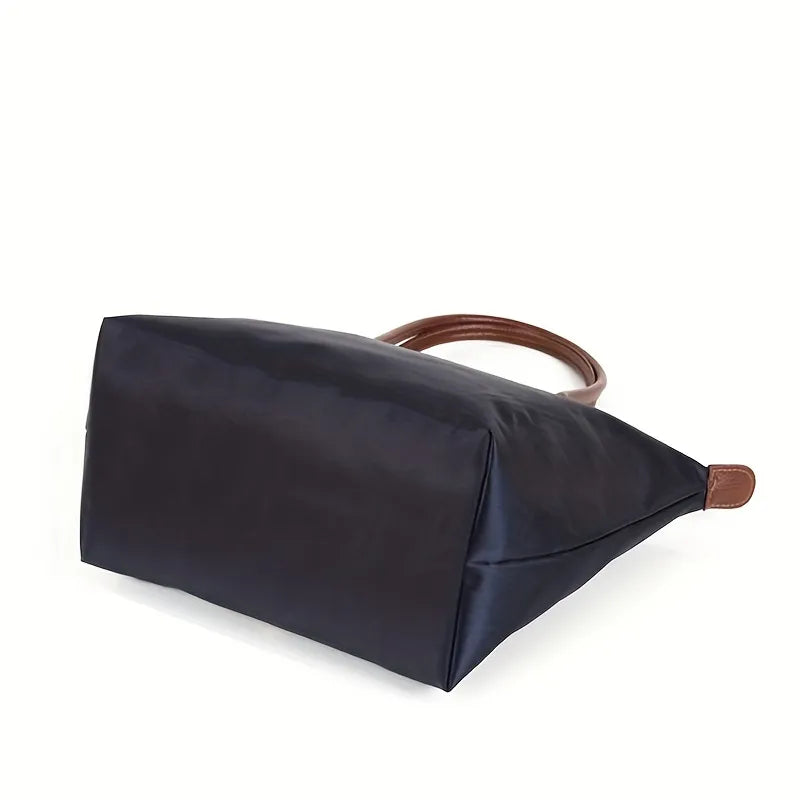 One-shoulder portable dumpling bag with sturdy handles for women