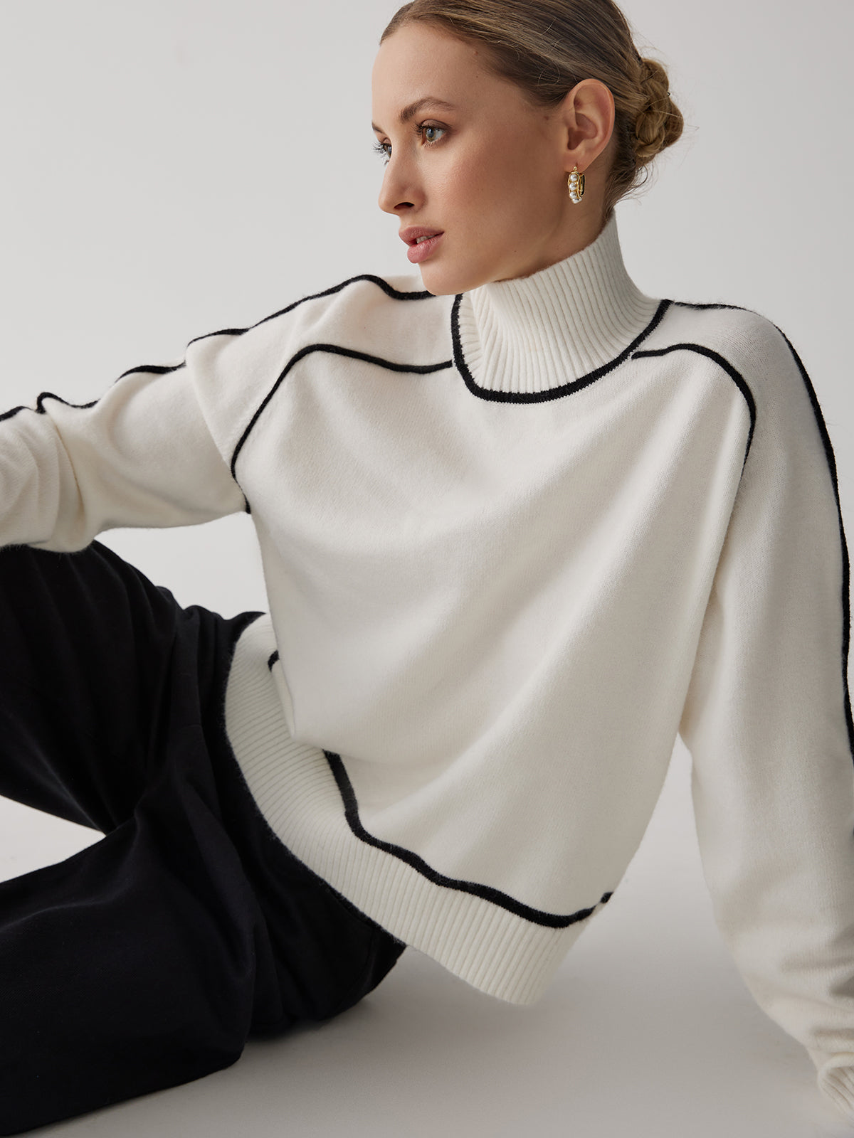 Stylish turtleneck long sleeve sweater with black striped design