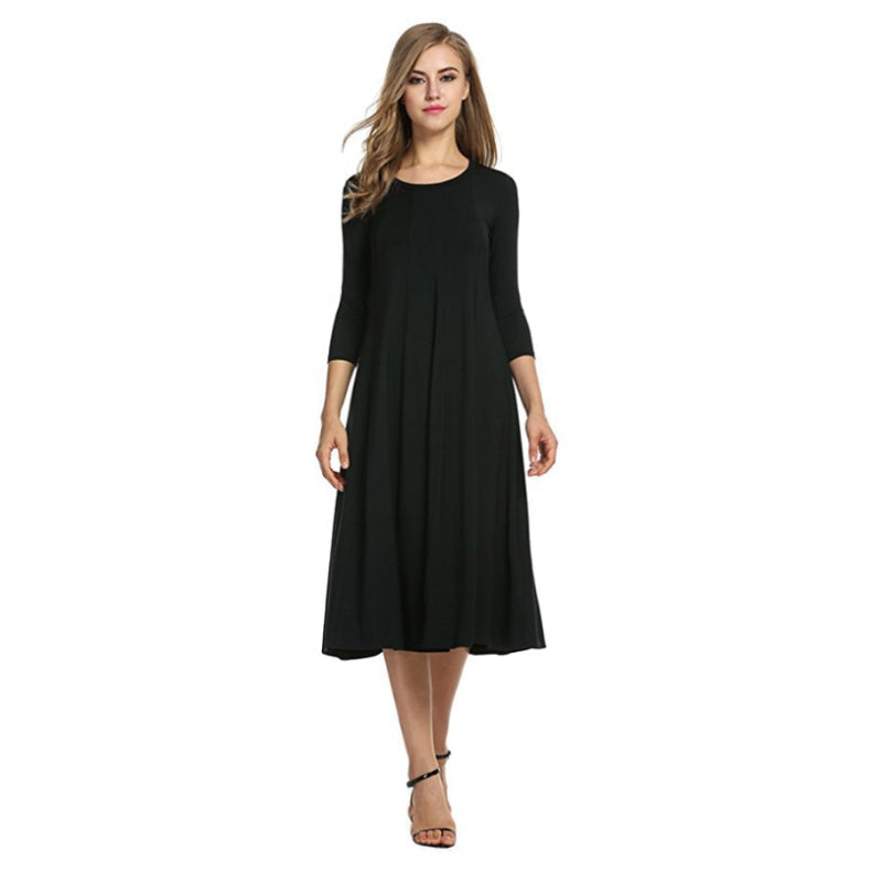 Women's A-Line Midi Dress - Flowy Fabric - Round Neck - Three-Quarter Sleeve