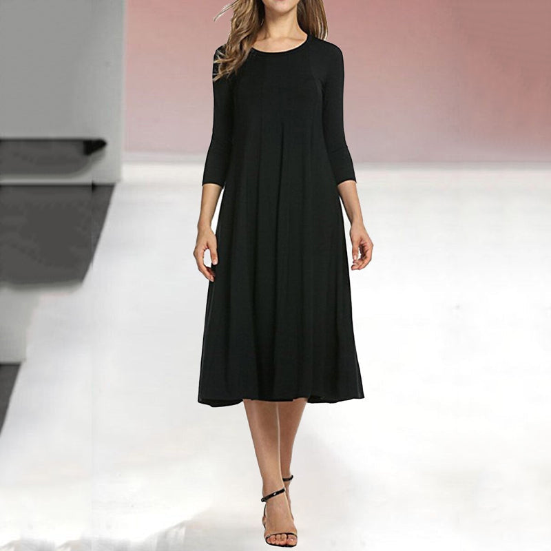 Women's A-Line Midi Dress - Flowy Fabric - Round Neck - Three-Quarter Sleeve