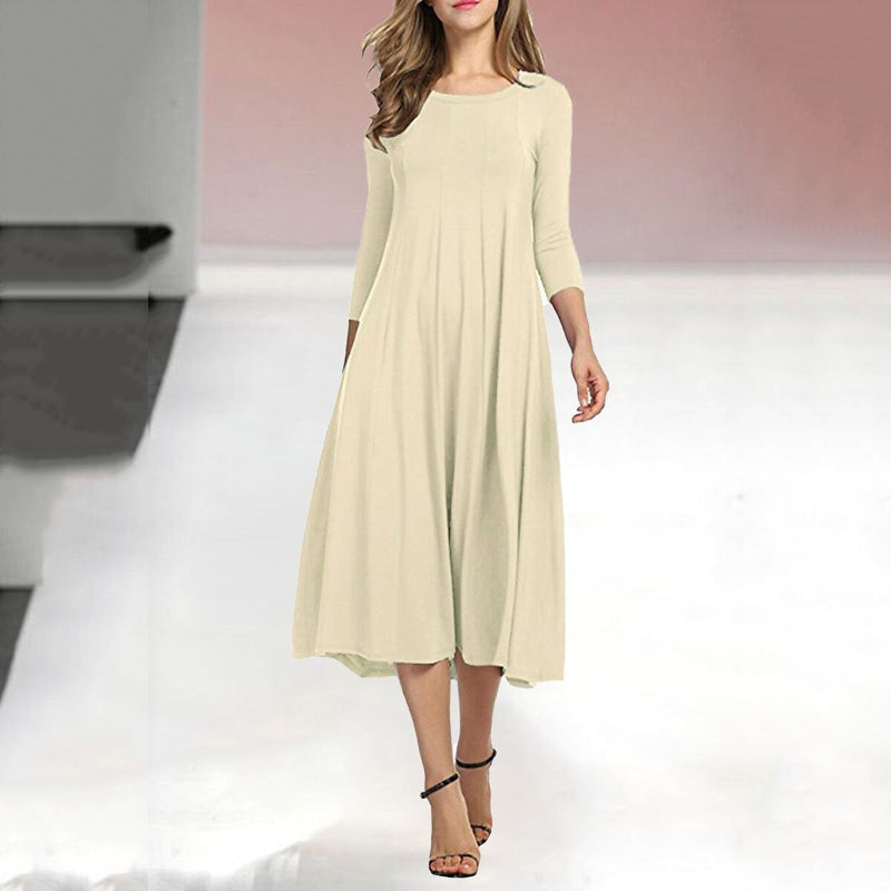 Women's A-Line Midi Dress - Flowy Fabric - Round Neck - Three-Quarter Sleeve