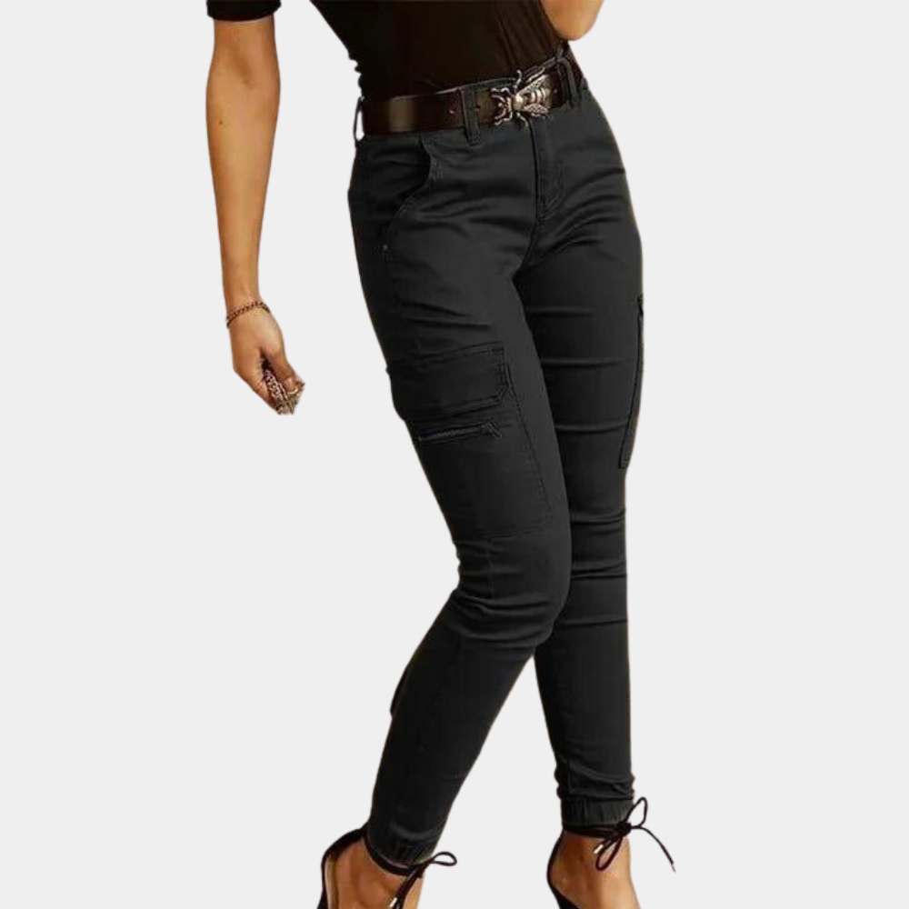Women’s mid-waist trousers with button closure and cuffed pockets