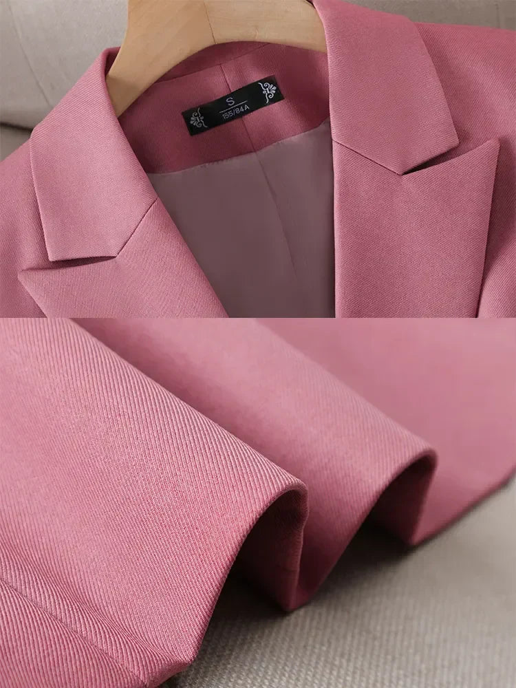 Women's elegant long blazer with pearl closure