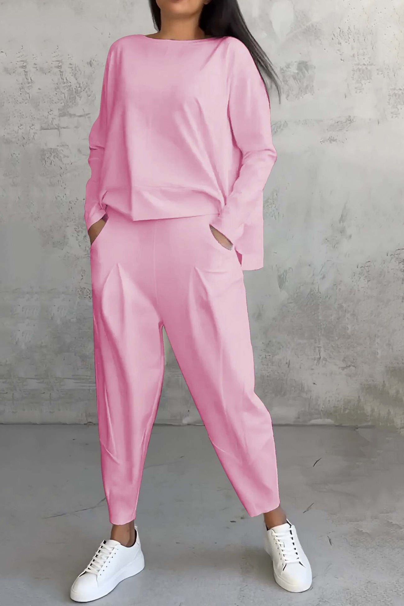 Women's high low hem sweatshirt and cropped trouser set