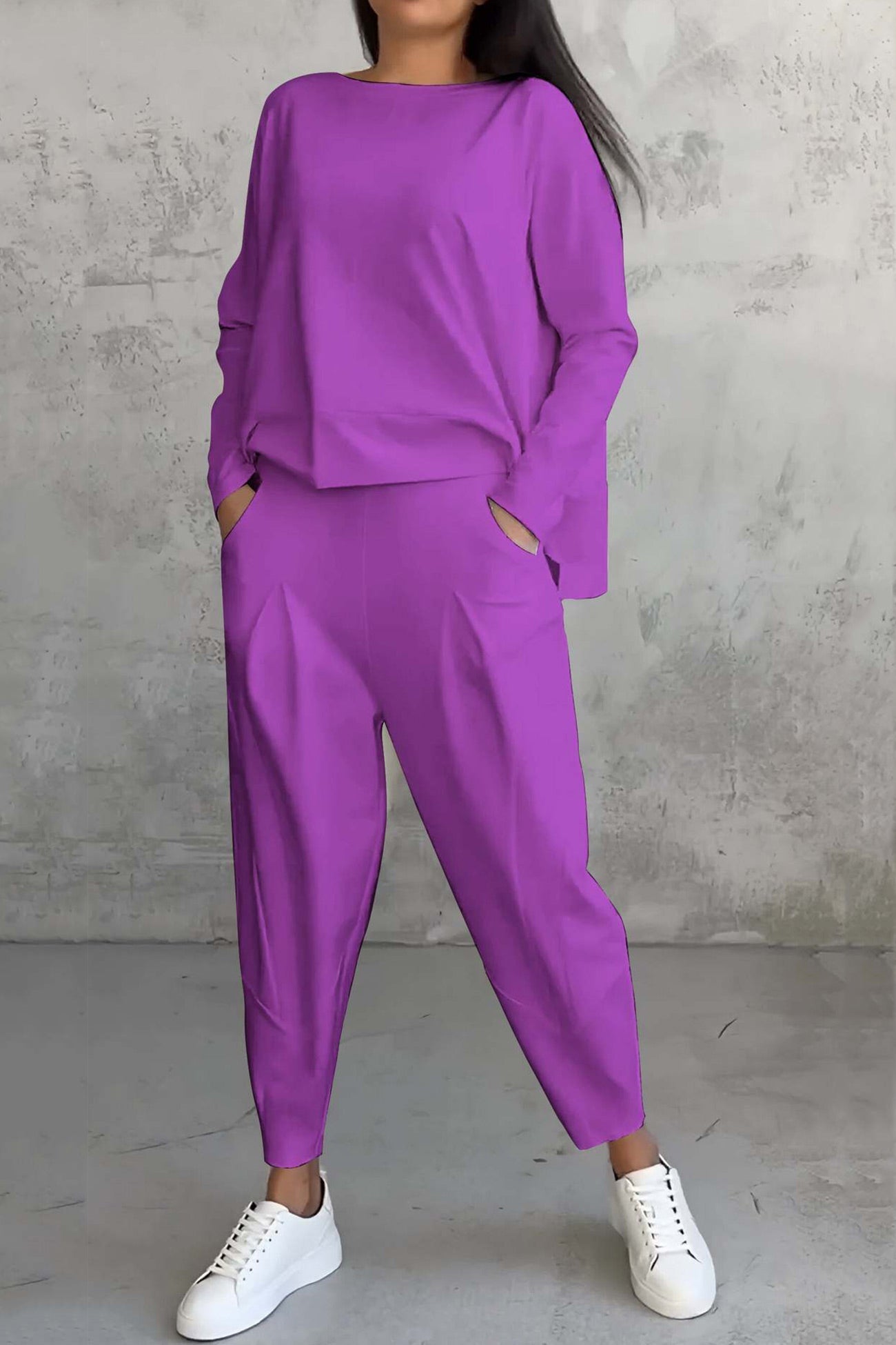 Women's high low hem sweatshirt and cropped trouser set