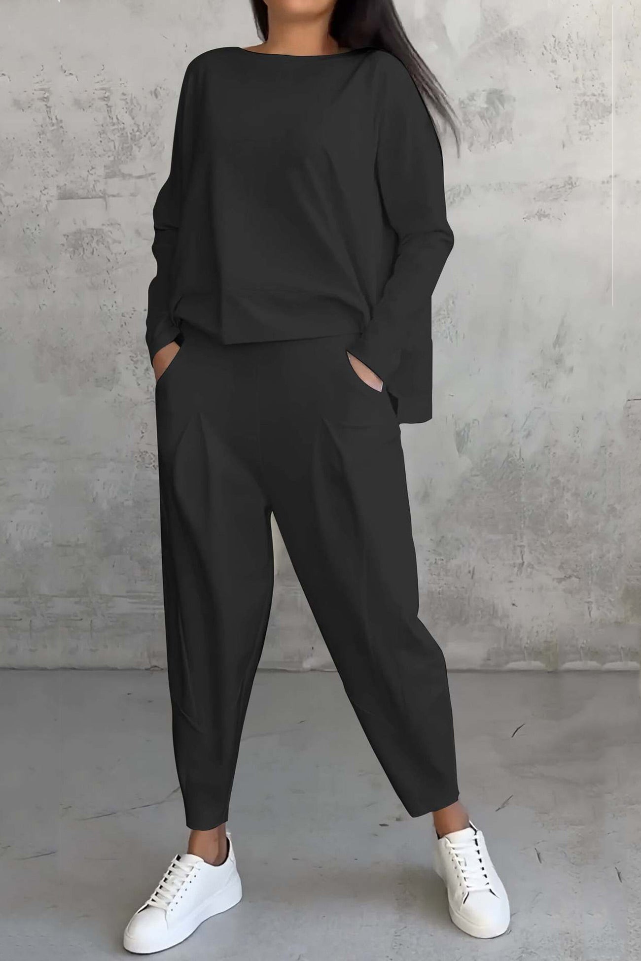 Women's high low hem sweatshirt and cropped trouser set