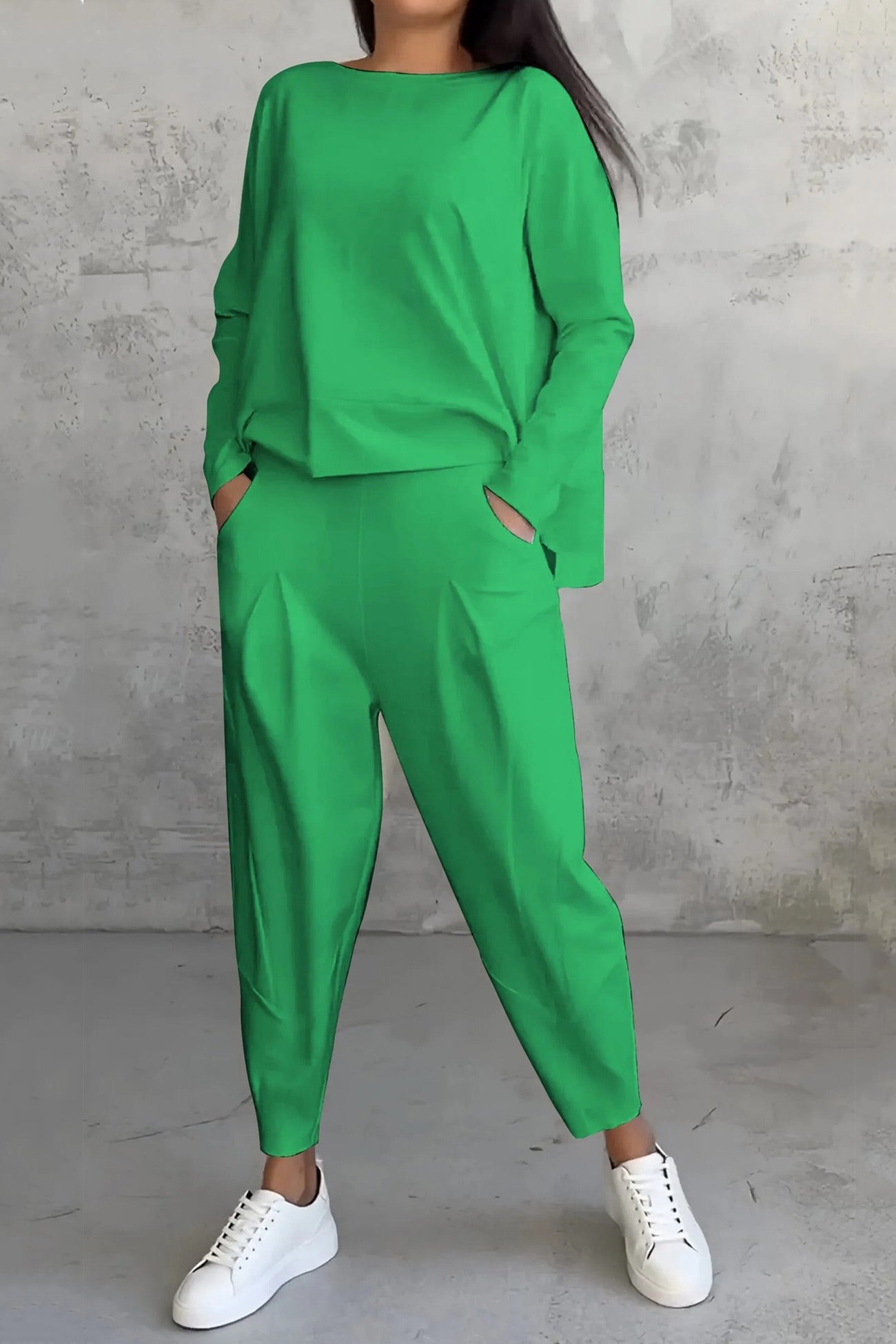 Women's high low hem sweatshirt and cropped trouser set