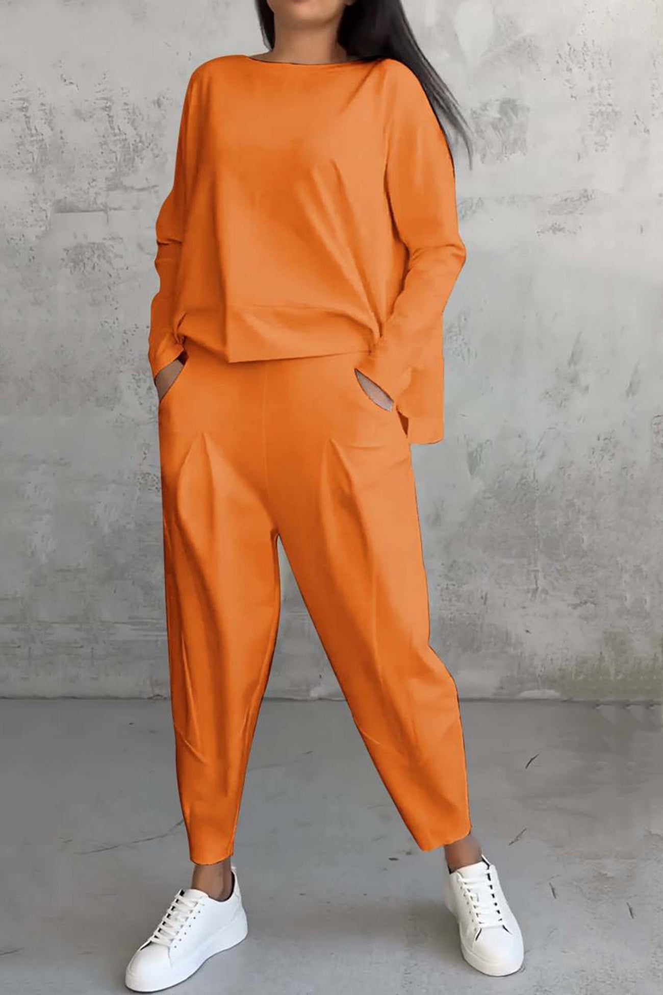 Women's high low hem sweatshirt and cropped trouser set