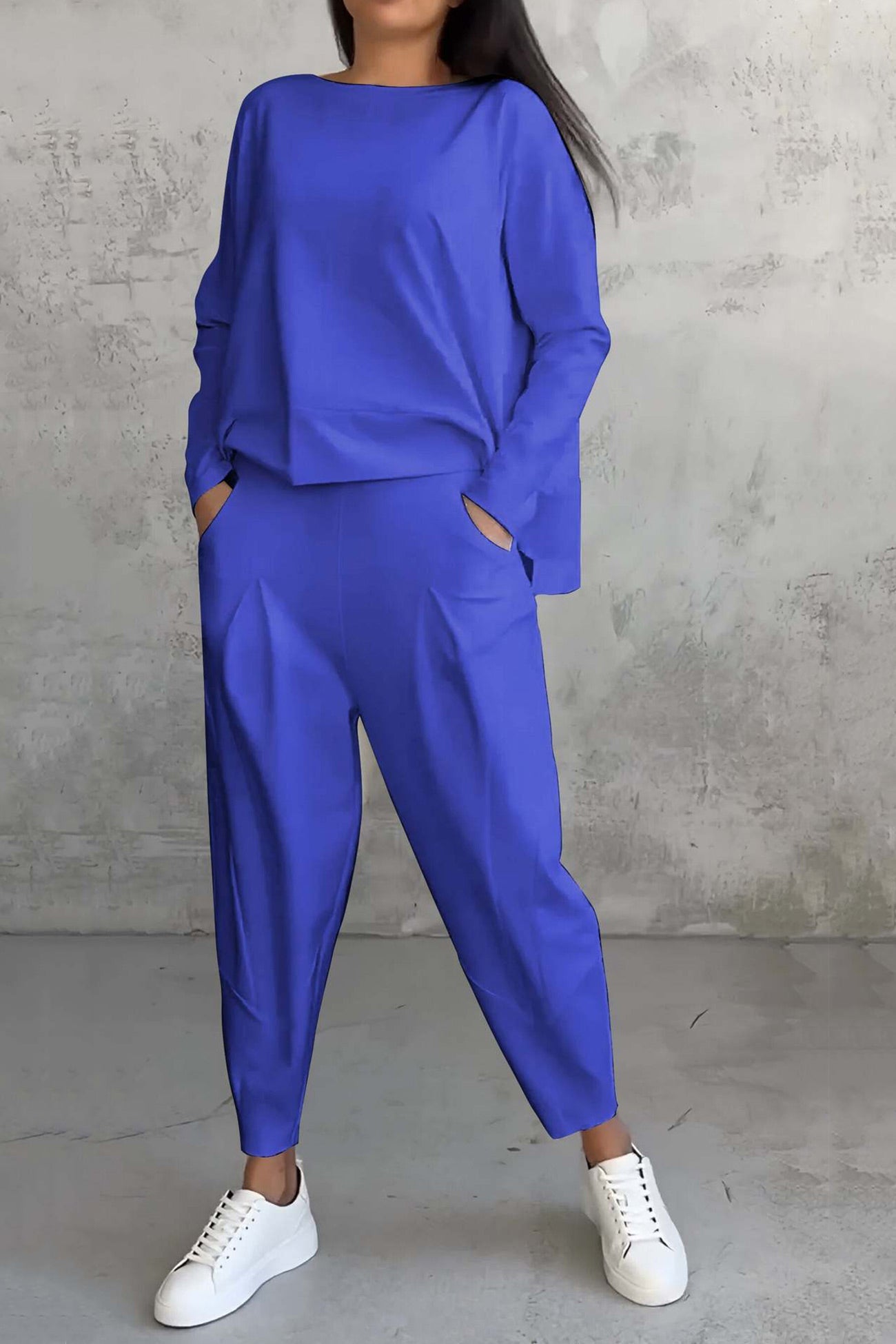 Women's high low hem sweatshirt and cropped trouser set