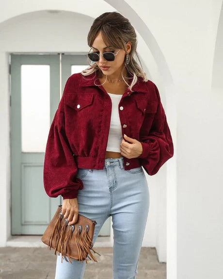 Women's shortened jacket with button closure and front pocket