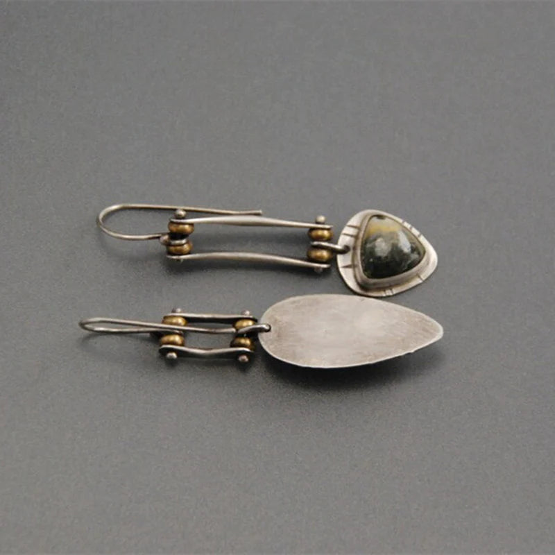 Long mechanical punk-style earrings