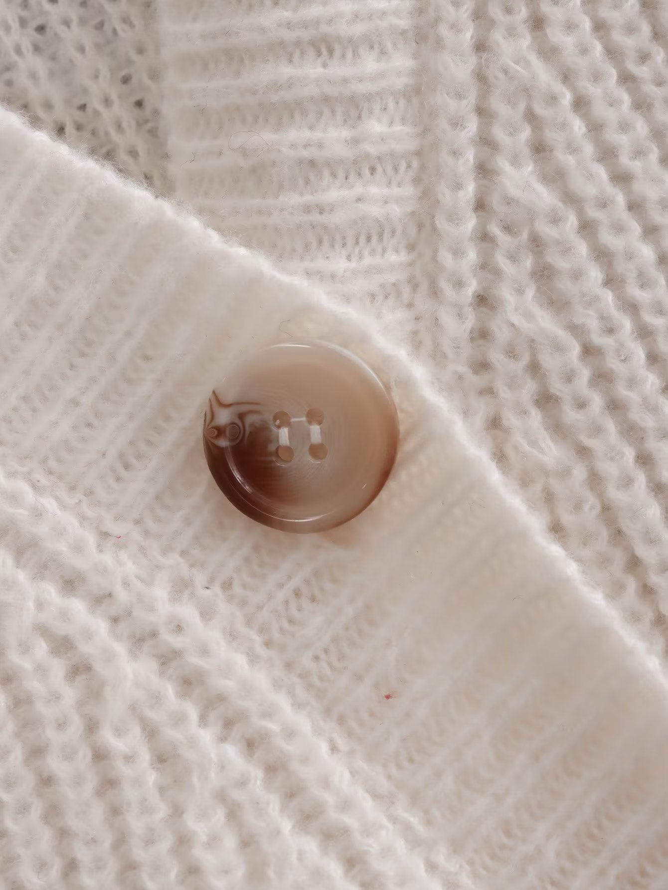 Women's v-neck loose slant button knitted jacket