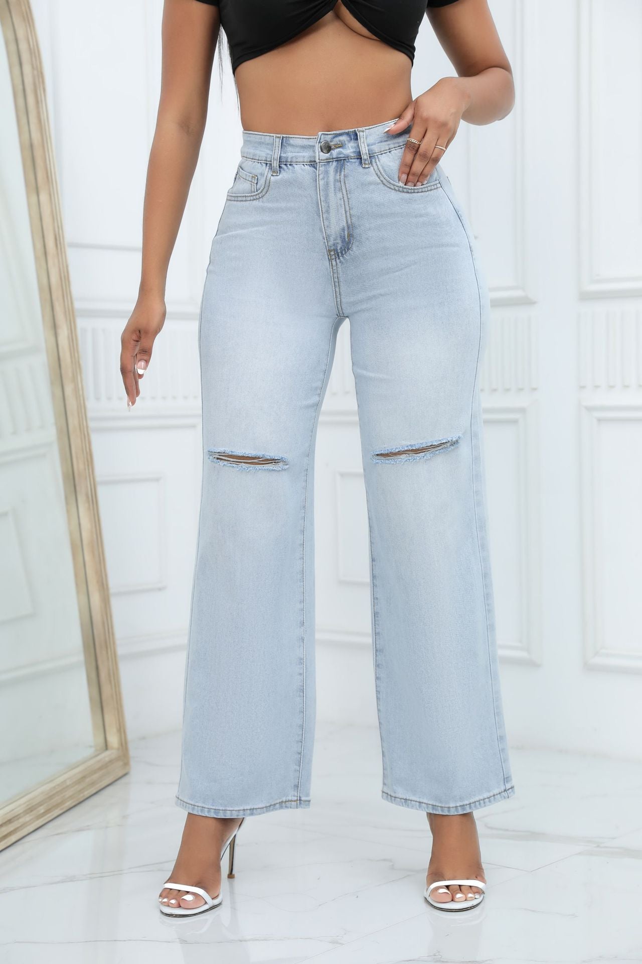 Women's mid-waist loose ripped bell-bottom jeans