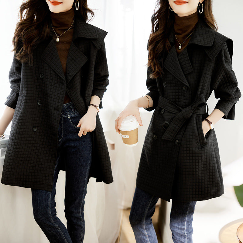 Women's mid-length waffle trench coat with lapel collar and belt