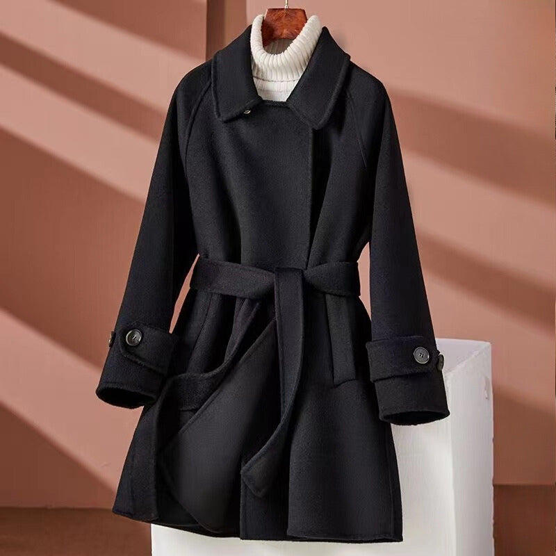 Women's reversible mid-length with belt cinched waist jacket