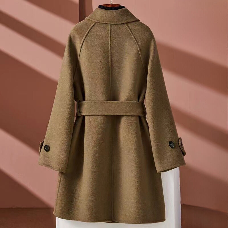 Women's reversible mid-length with belt cinched waist jacket