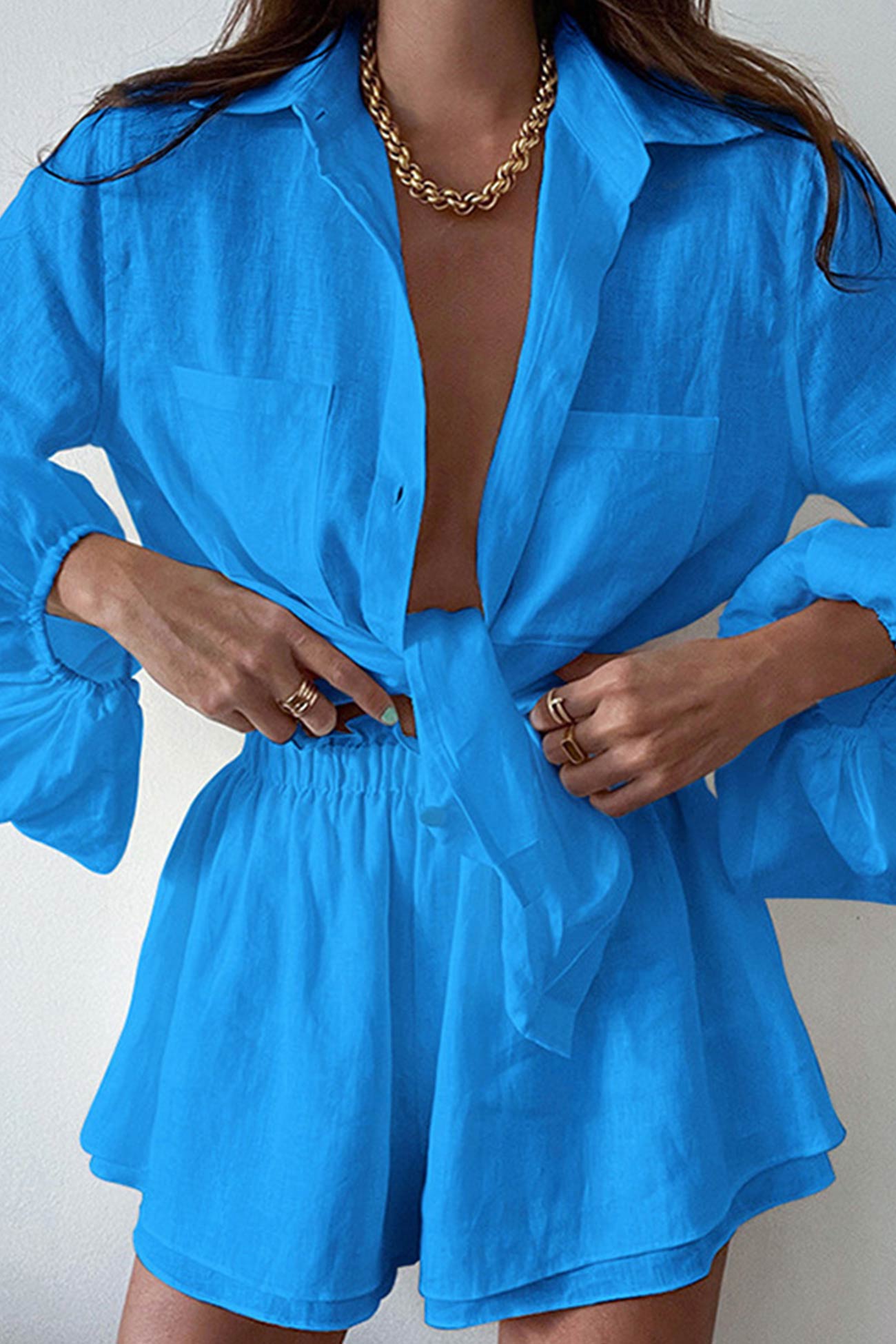 Liyana -pocketed solid color shirt and ruffle waist shorts set