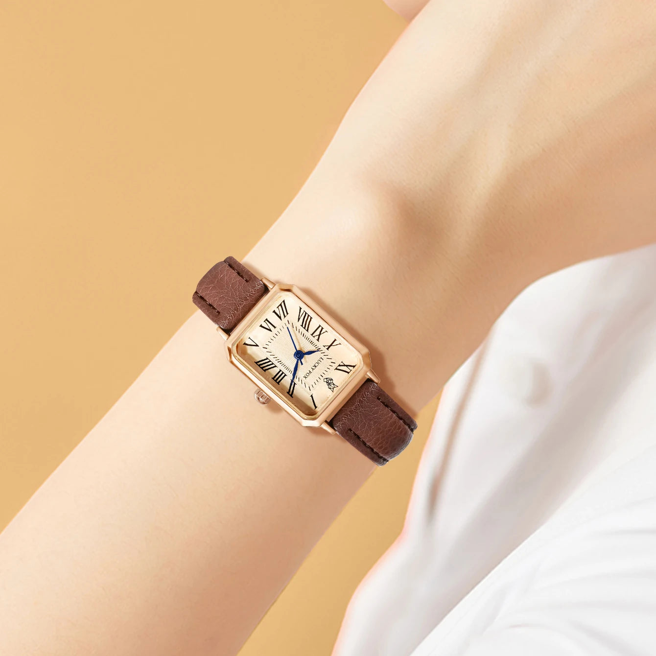 Women's vintage-inspired rectangular watch with leather strap