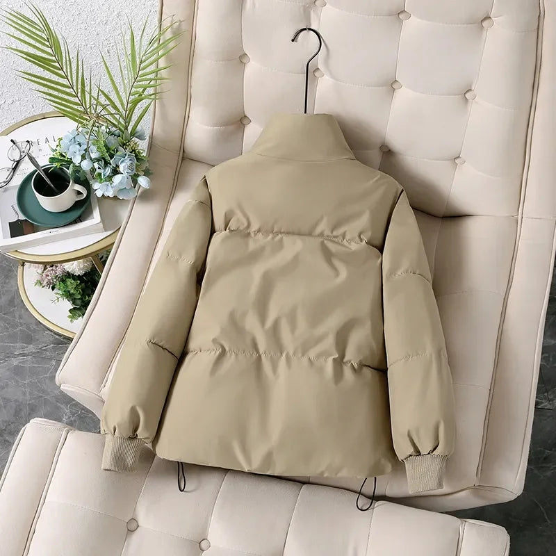 Women's winter puffer jacket with a stand collar