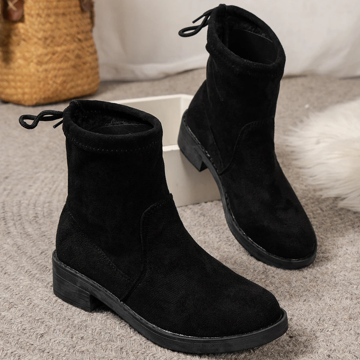 Women's low heel ankle boots with drawstring closure