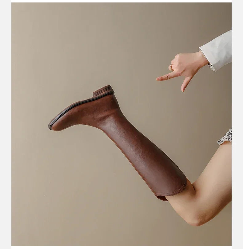 Women's knee-high faux leather boots