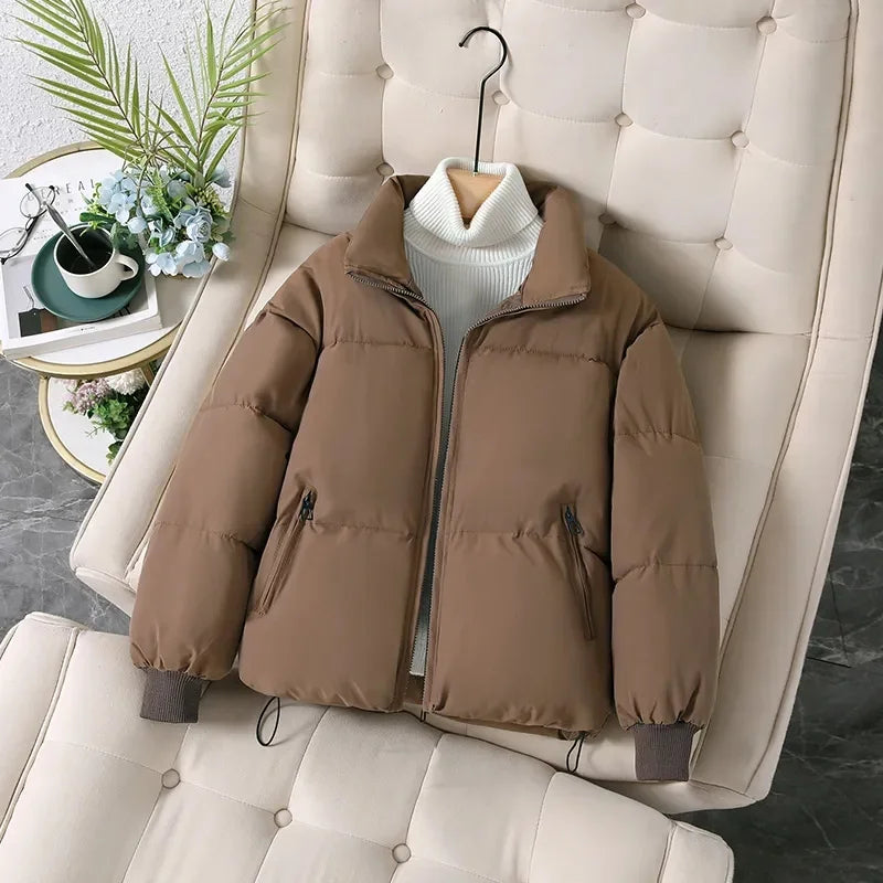 Women's winter puffer jacket with a stand collar