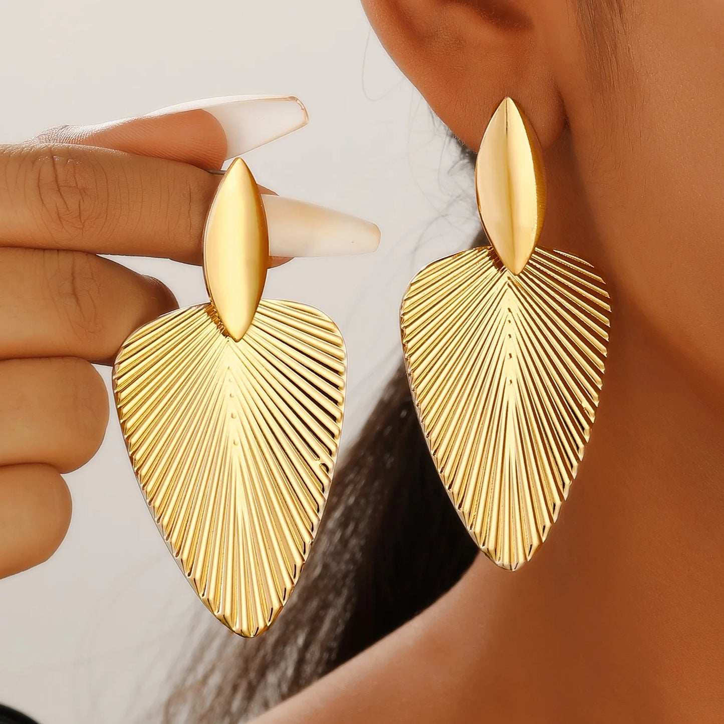 Textured leaf drop earrings