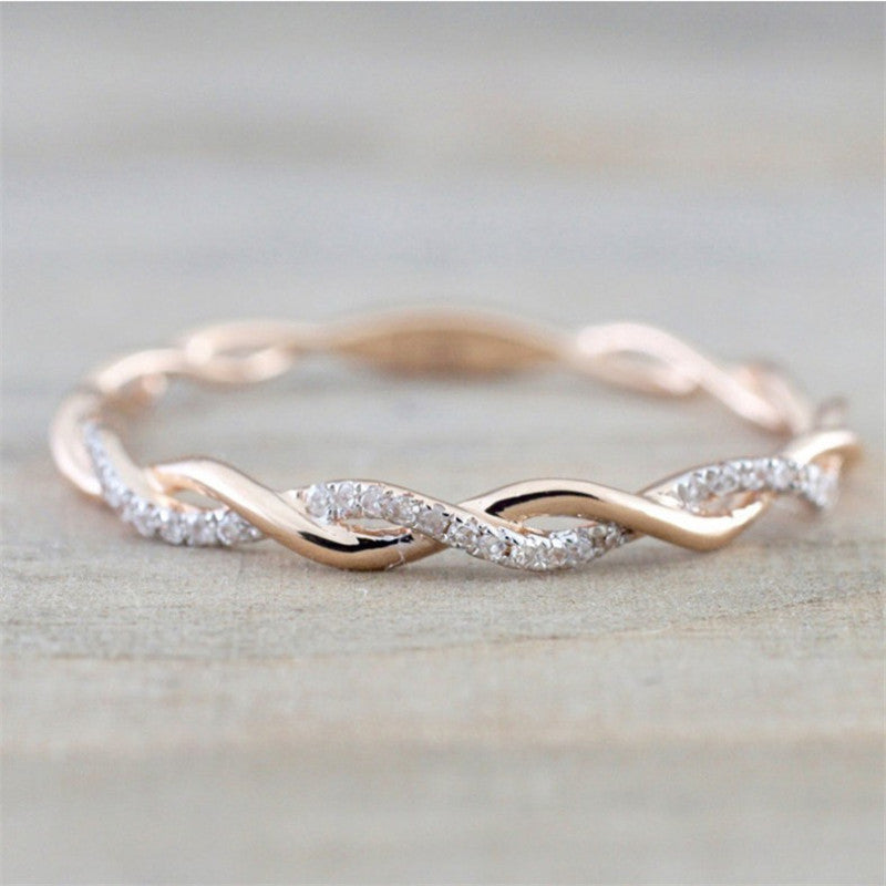 Sparkling Zirconia Twisted Band Ring