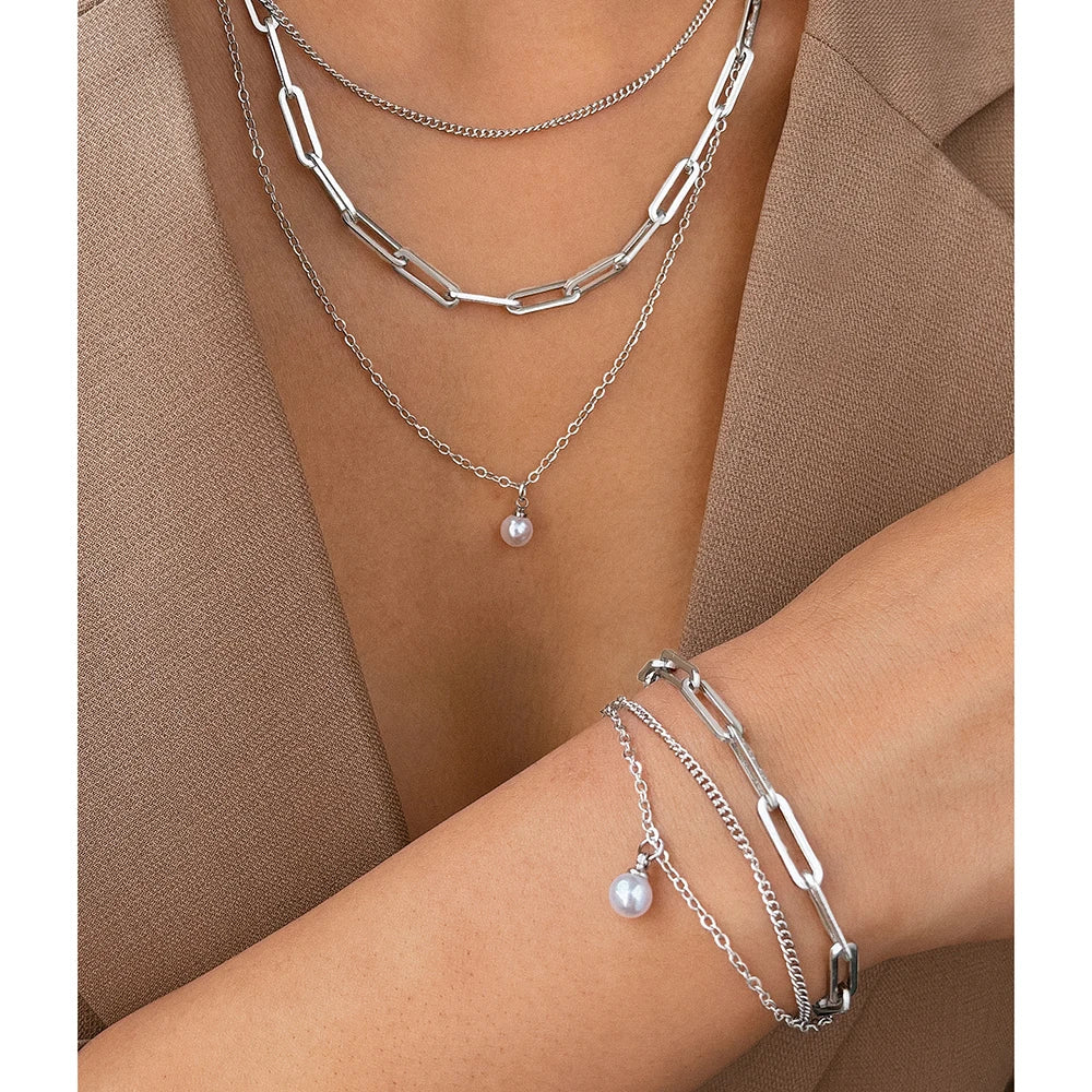Layered chain necklace and bracelet set with pearl accent